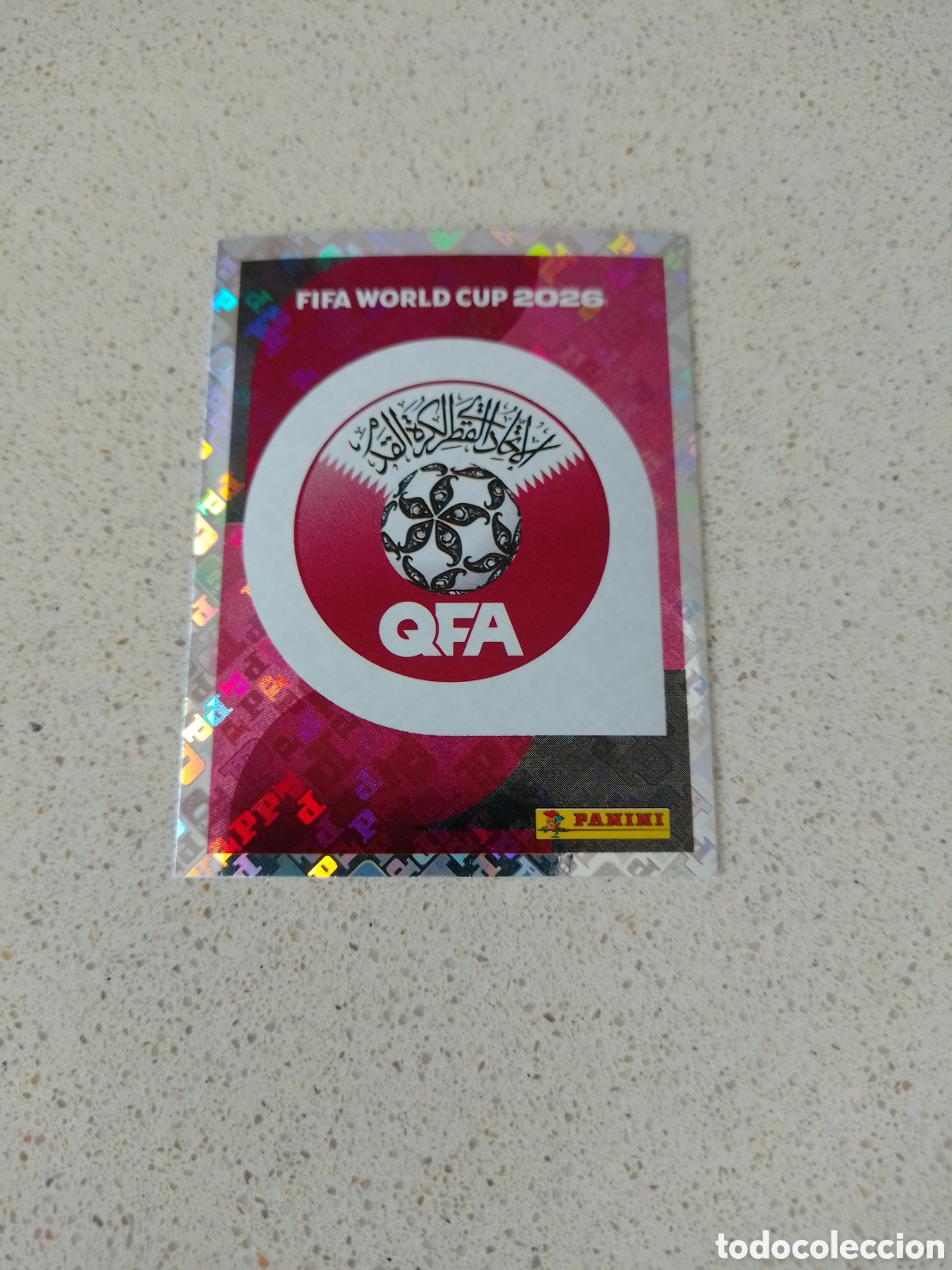 Fu&szlig;ball-Sticker: CROMO NUMERO 1 ESCUDO QATAR. MUNDIAL 2026. PANINI.