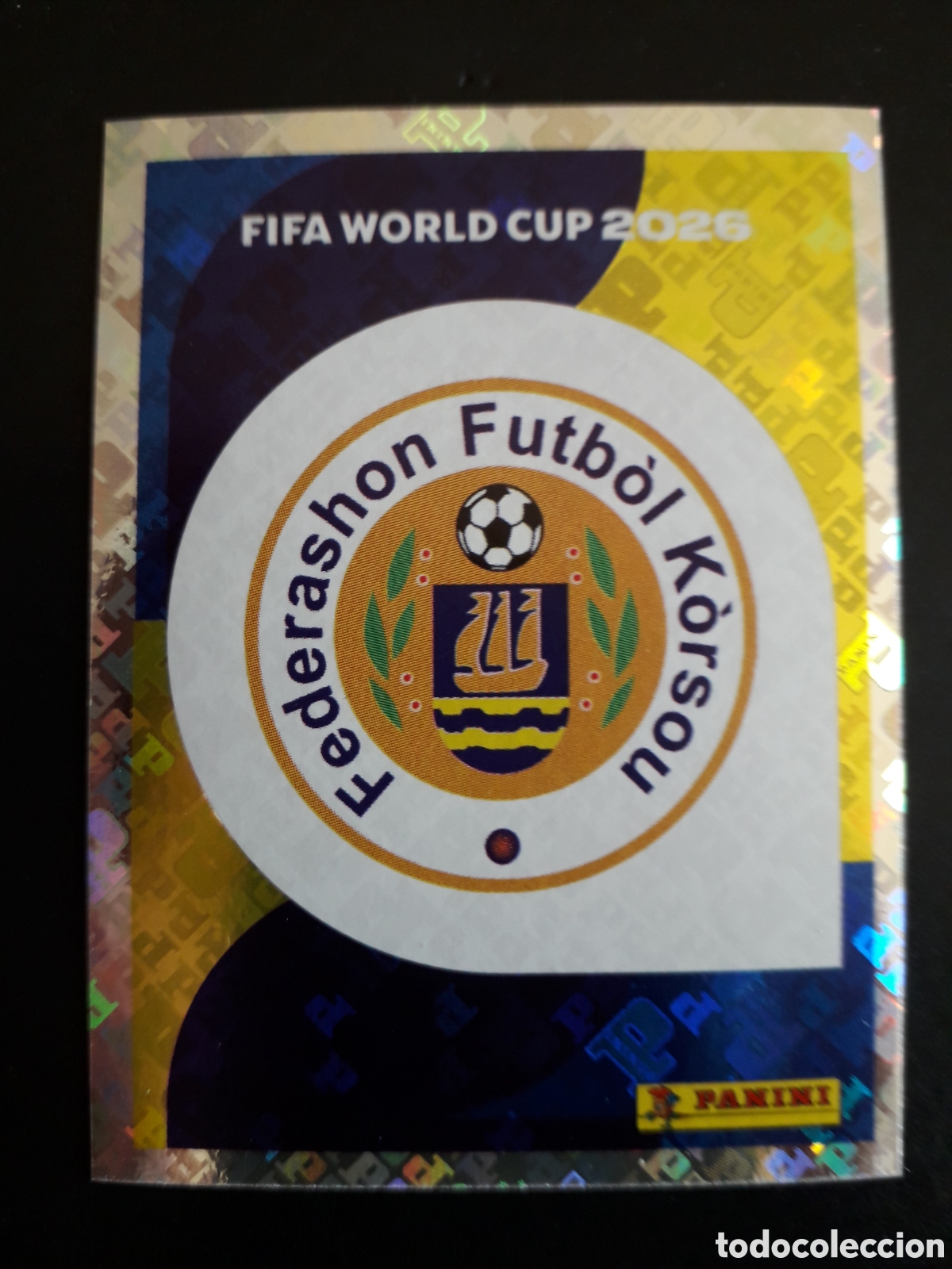 Cartes &agrave; collectionner de Football: ESCUDO CURA&Ccedil;AO CUW 1 MUNDIAL F&Uacute;TBOL 2026 FIFA WORLD CUP PANINI SIN PEGAR PEDIDO M&Iacute;NIMO 3&euro;