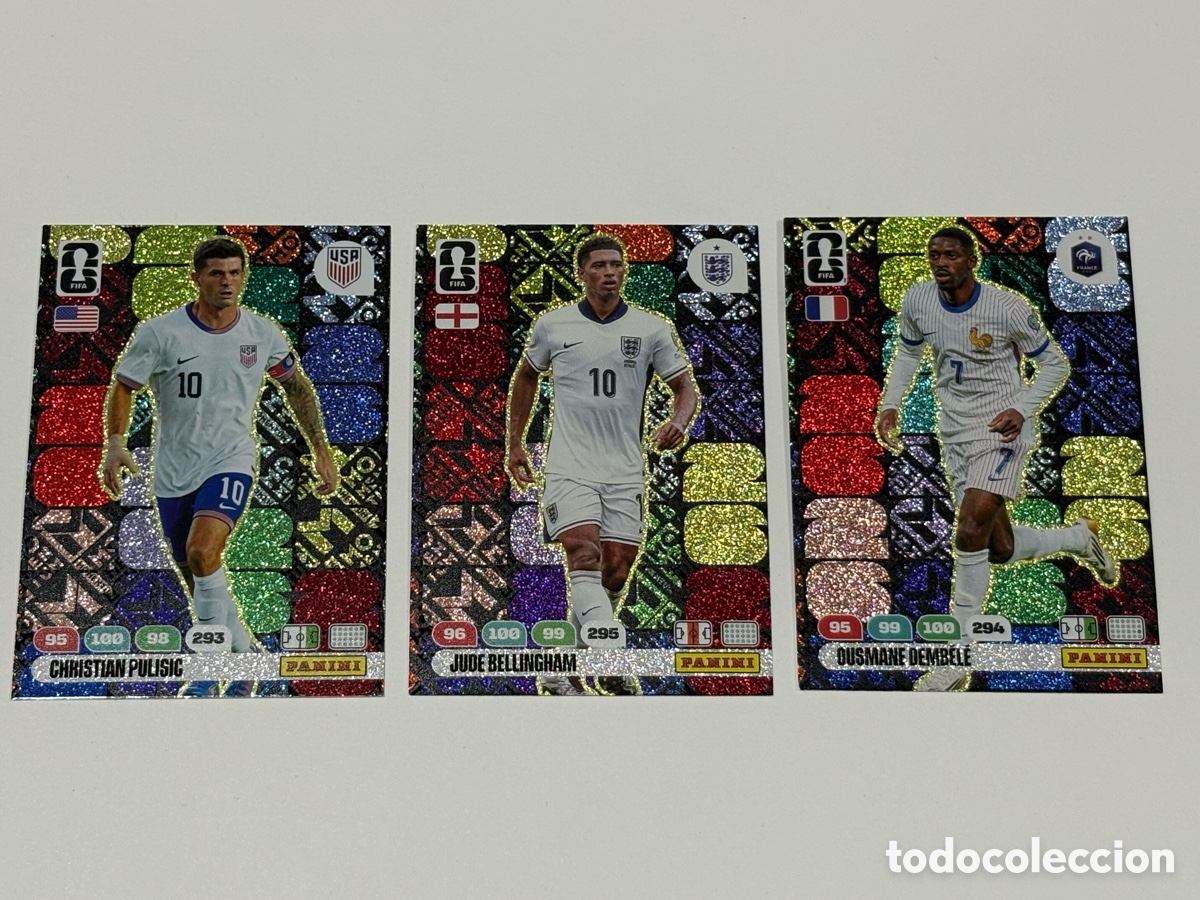 Cromos de Futebol: Pack 3 Panini Copa Mundial Fifa 2026 Momentum Pulisic Demb&eacute;l&eacute; Bellingham Messi