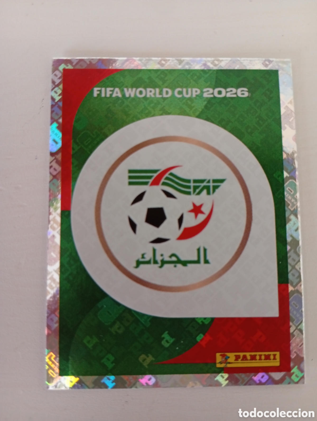 Cartes &agrave; collectionner de Football: B31 ALG1 ALG 1 ESCUDO LOGO BADGE ARGELIA / ALGERIA MUNDIAL FIFA WORLD CUP 2026 STICKER PANINI