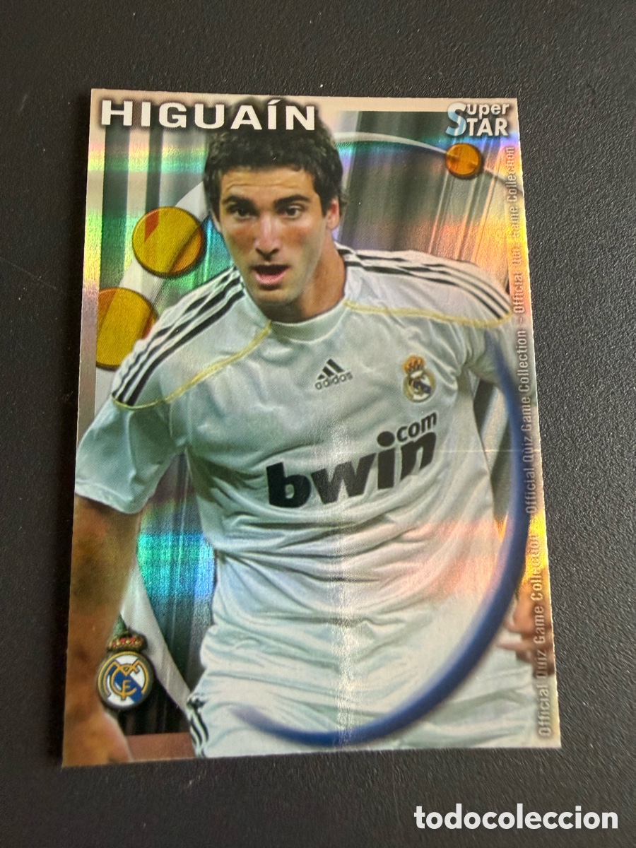 Cromos de f&uacute;tbol: MUNDICROMO 2011. 053. HIGUAIN ( Real Madrid). S&uacute;per STAR. Brillo Rayas