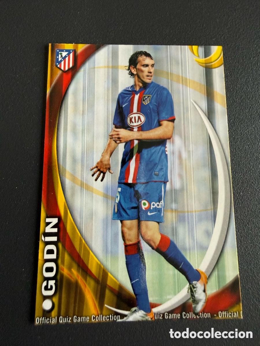 Cromos de f&uacute;tbol: MUNDICROMO 2011. 661 GODIN ( Atl&eacute;tico) UH