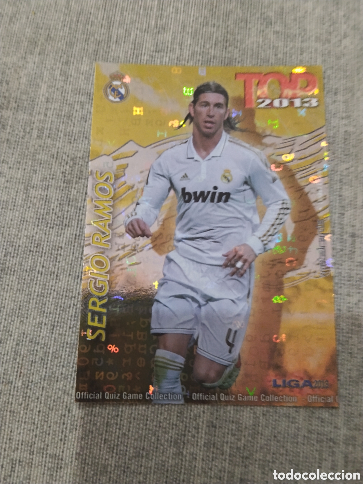 Cromos de f&uacute;tbol: MUNDICROMO QUIZ GAME 2013 (2012 13) N&ordm; 568 SERGIO RAMOS - R. MADRID (TOP AMARILLO / DORADO LETRAS)
