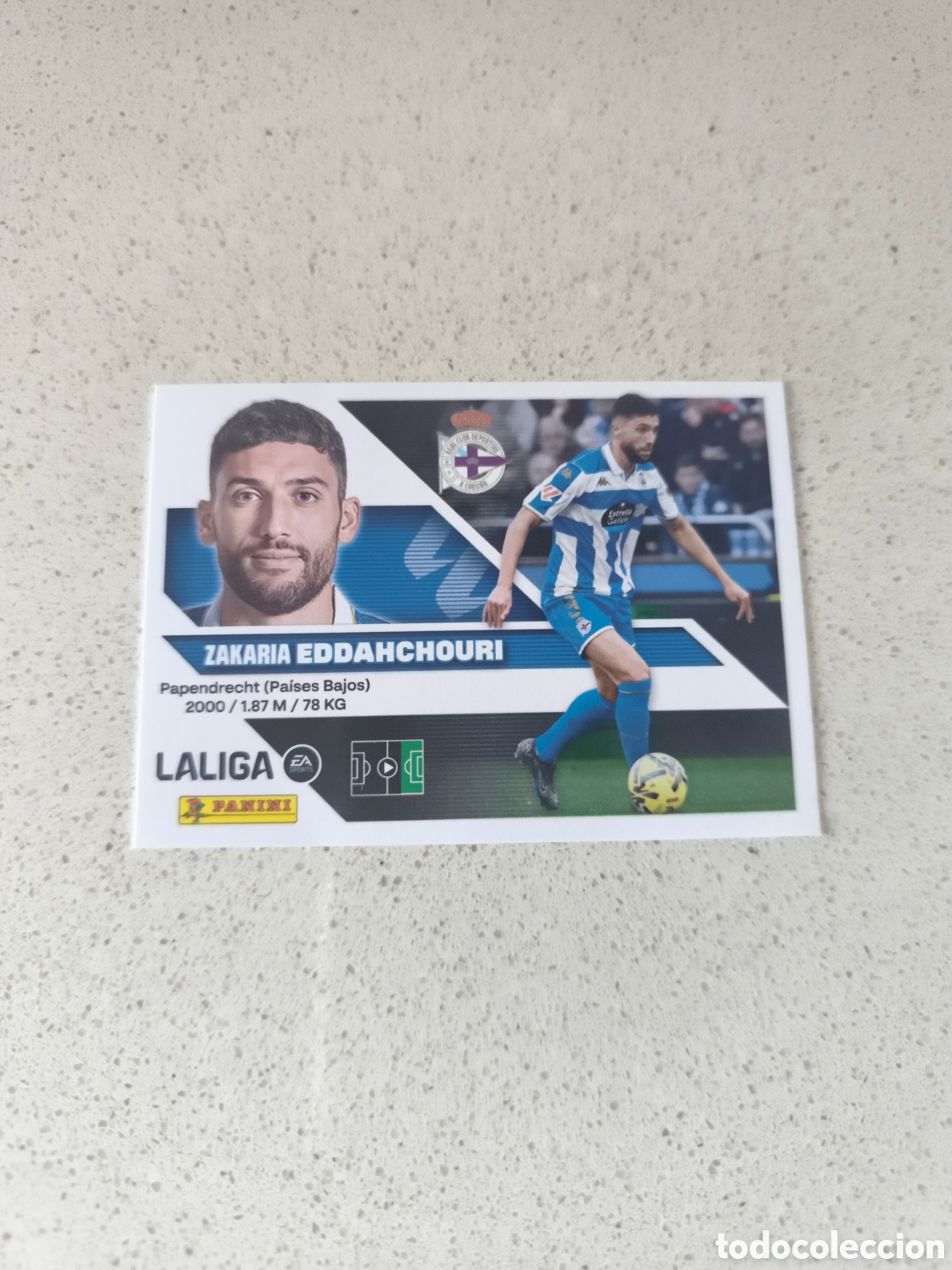 Cromos de f&uacute;tbol: CROMO NUMERO 19 EDDAHCHOURI DEPORTIVO DE LA CORU&Ntilde;A. LIGA ESTE 26/27. PANINI.