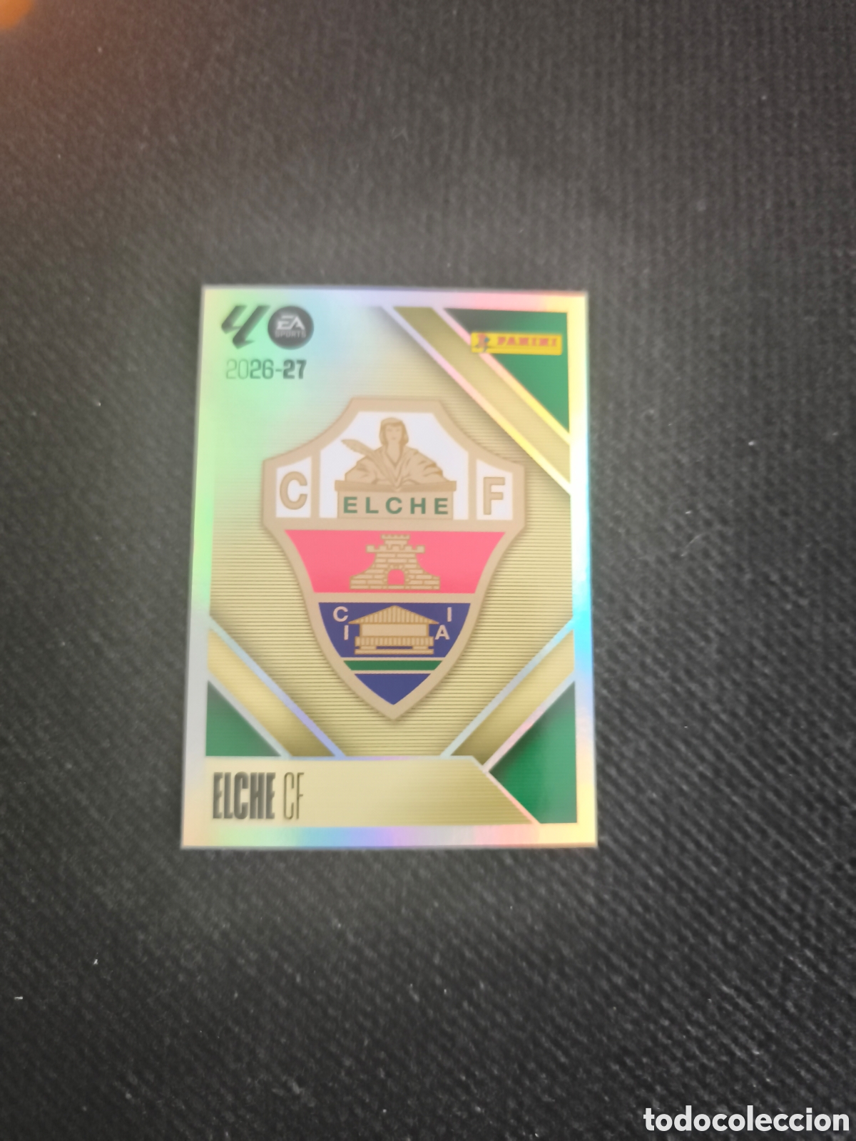 Cromos de f&uacute;tbol: CROMO N&Uacute;MERO 1 ESCUDO ELCHE. LIGA ESTE 26/27. PANINI.