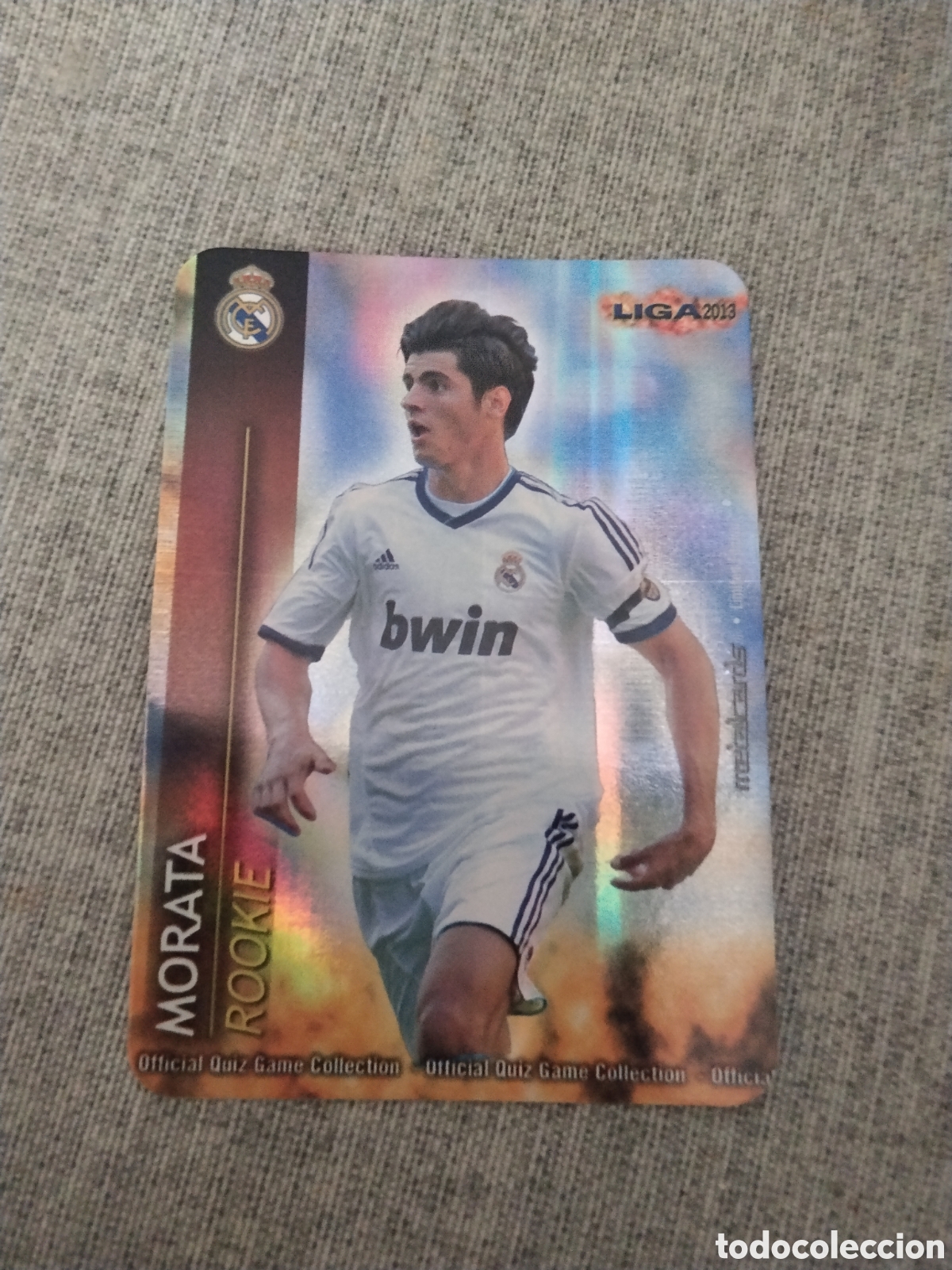 Cromos de f&uacute;tbol: MUNDICROMO QUIZ GAME LIGA 2013 - METALCARD ROOKIE MORATA - R. MADRID ( FONDO RAYAS VERTICALES)