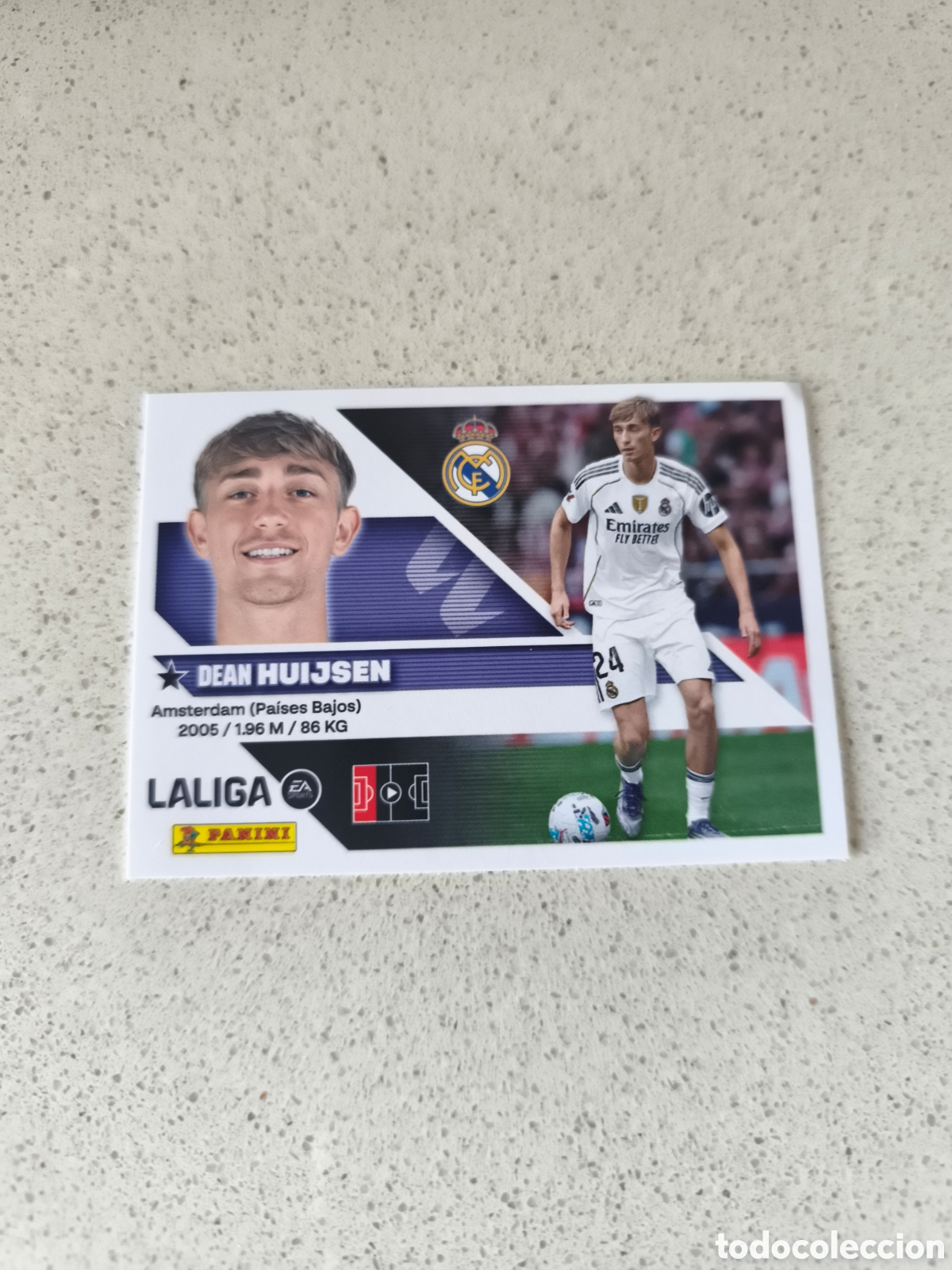 Cromos de f&uacute;tbol: CROMO N&Uacute;MERO 9 HUIJSEN REAL MADRID. LIGA ESTE 26/27. PANINI.