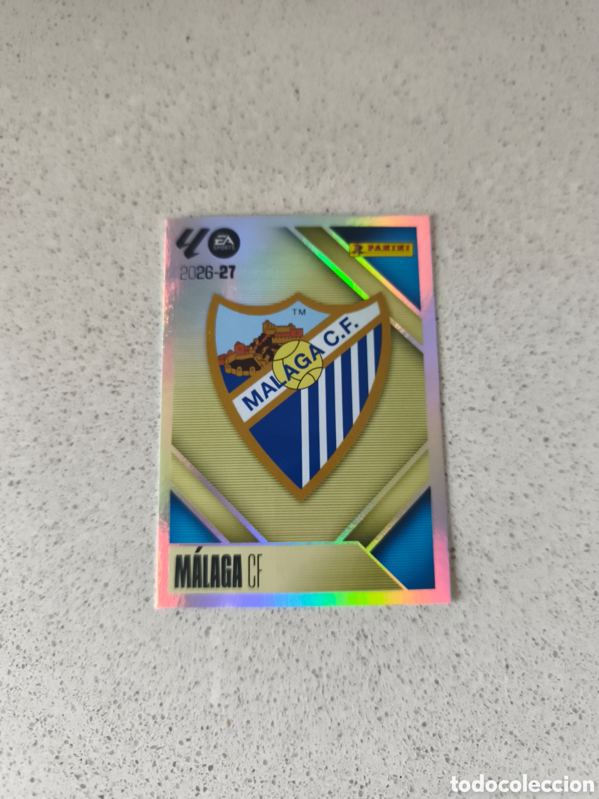 Cromos de Futebol: CROMO N&Uacute;MERO 1 ESCUDO MALAGA. LIGA ESTE 26/27. PANINI.