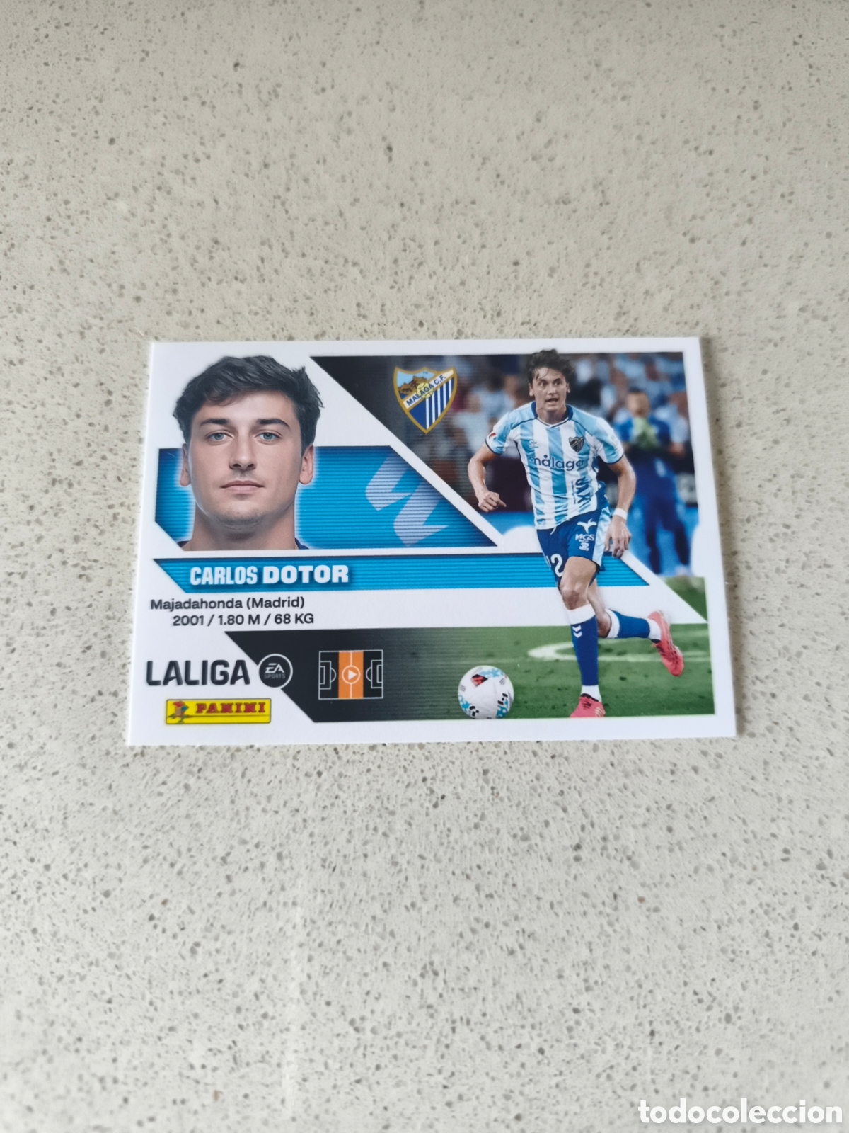Figurine di Calcio: CROMO N&Uacute;MERO 14 DOTOR MALAGA. LIGA ESTE 26/27. PANINI.