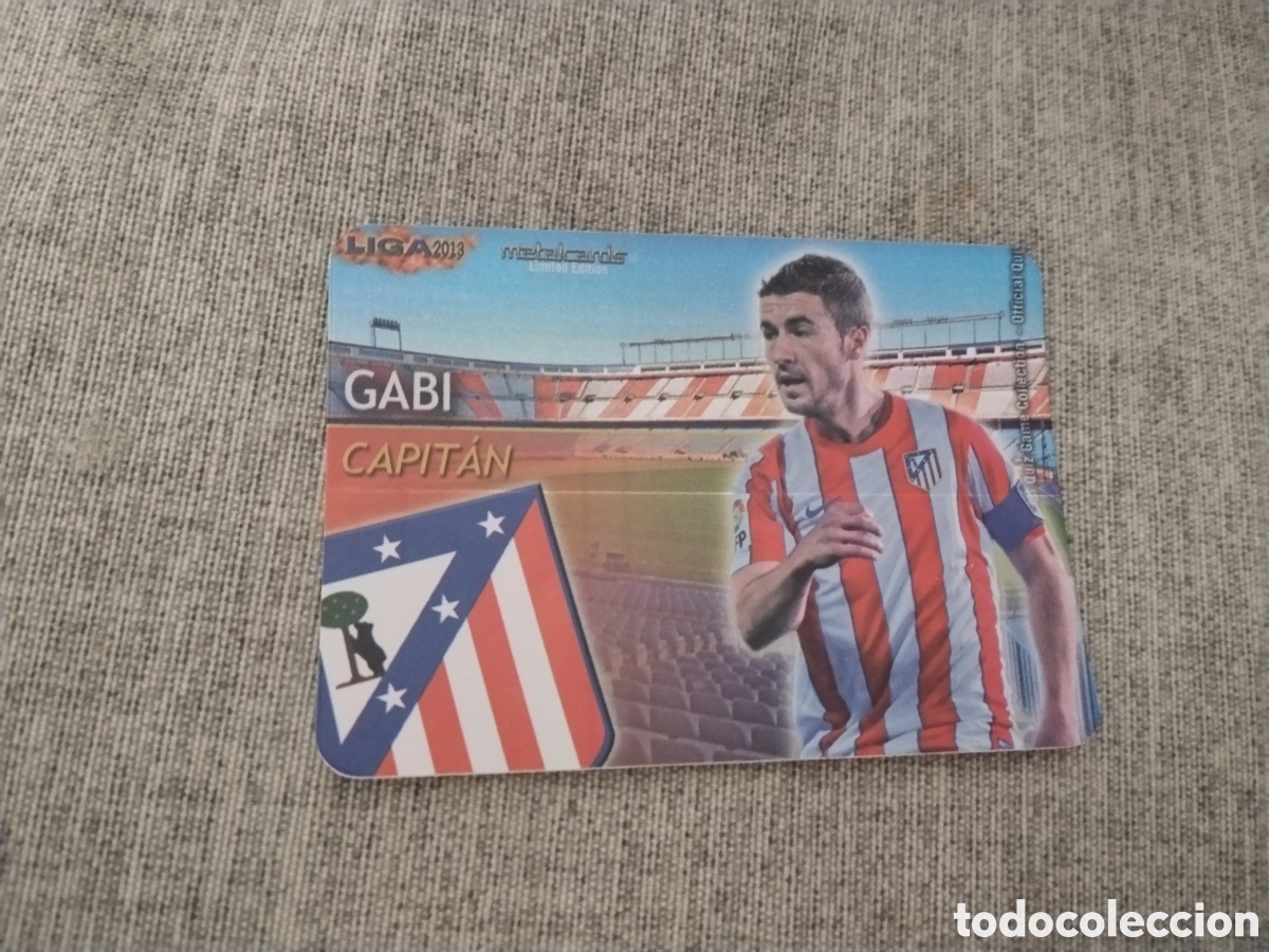 Fu&szlig;ball-Sticker: MUNDICROMO QUIZ GAME LIGA 2013 - METALCARD CAPITAN GABI - AT. MADRID (BRILLO LISO )
