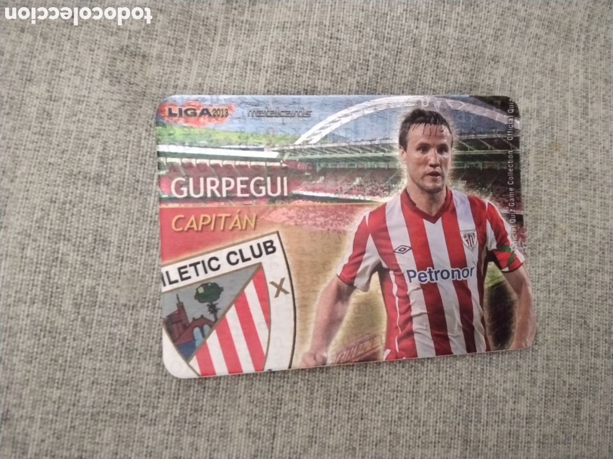 Cromos de f&uacute;tbol: MUNDICROMO QUIZ GAME LIGA 2013 - METALCARD CAPITAN GURPEGUI - ATH. BILBAO ( FONDO LETRAS )