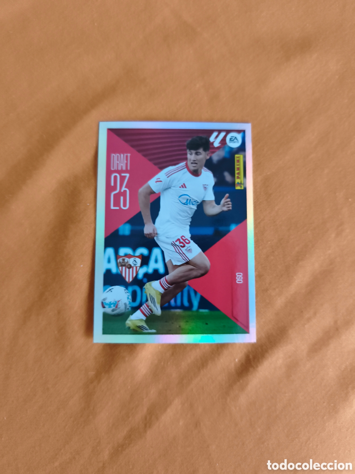 Cromos de f&uacute;tbol: CROMO N&Uacute;MERO 17 OSO SEVILLA DRAFT 23. LIGA ESTE 26/27. PANINI.