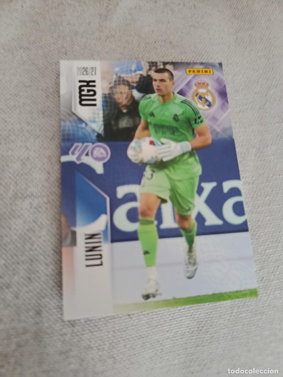 Fu&szlig;ball-Sticker: Megacracks 26/27. 219- Lunin. Real Madrid.