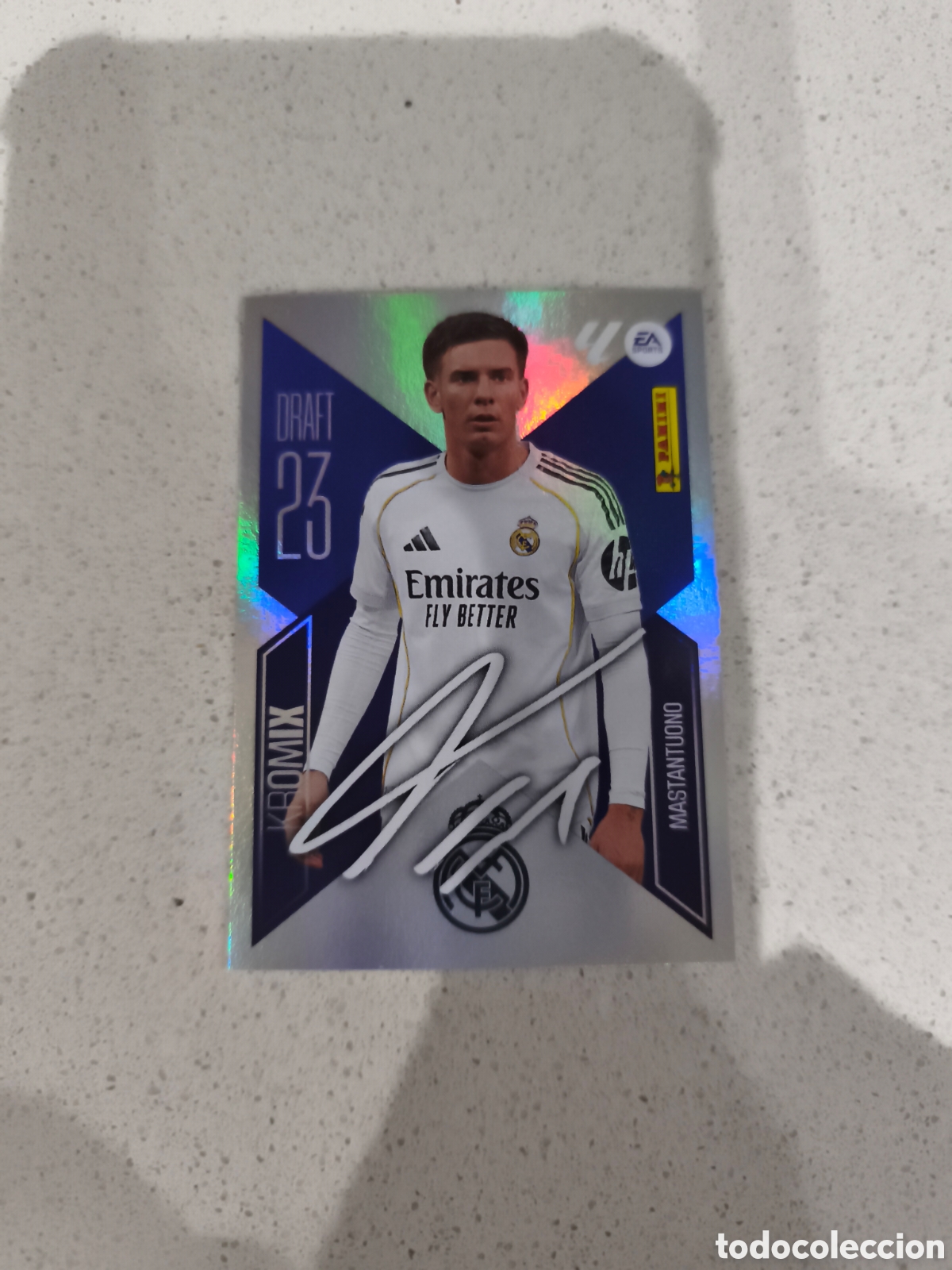 Cromos de f&uacute;tbol: CROMO ROOKIE N&Uacute;MERO K16 MASTANTUONO REAL MADRID DRAFT 23 KROMIX. LIGA ESTE 26/27. PANINI.