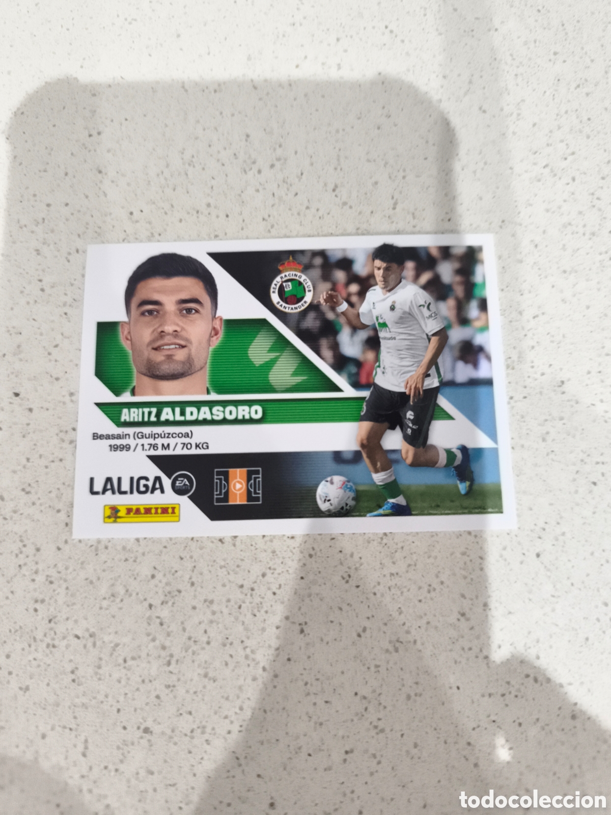 Cromos de f&uacute;tbol: CROMO N&Uacute;MERO 14 ALDASORO RACING DE SANTANDER. LIGA ESTE 26/27. PANINI.