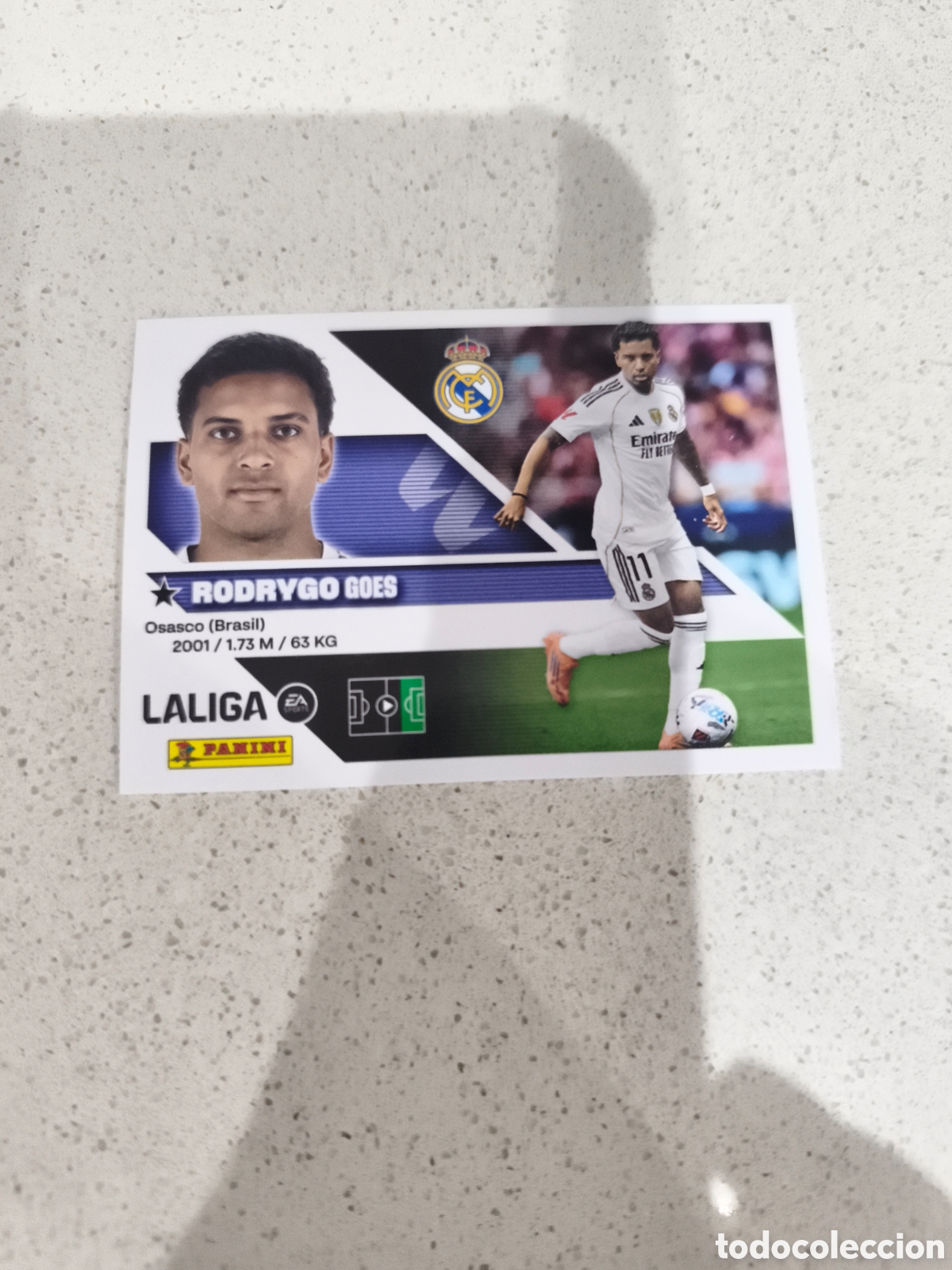 Cromos de f&uacute;tbol: CROMO N&Uacute;MERO 18 RODRYGO REAL MADRID. LIGA ESTE 26/27. PANINI.