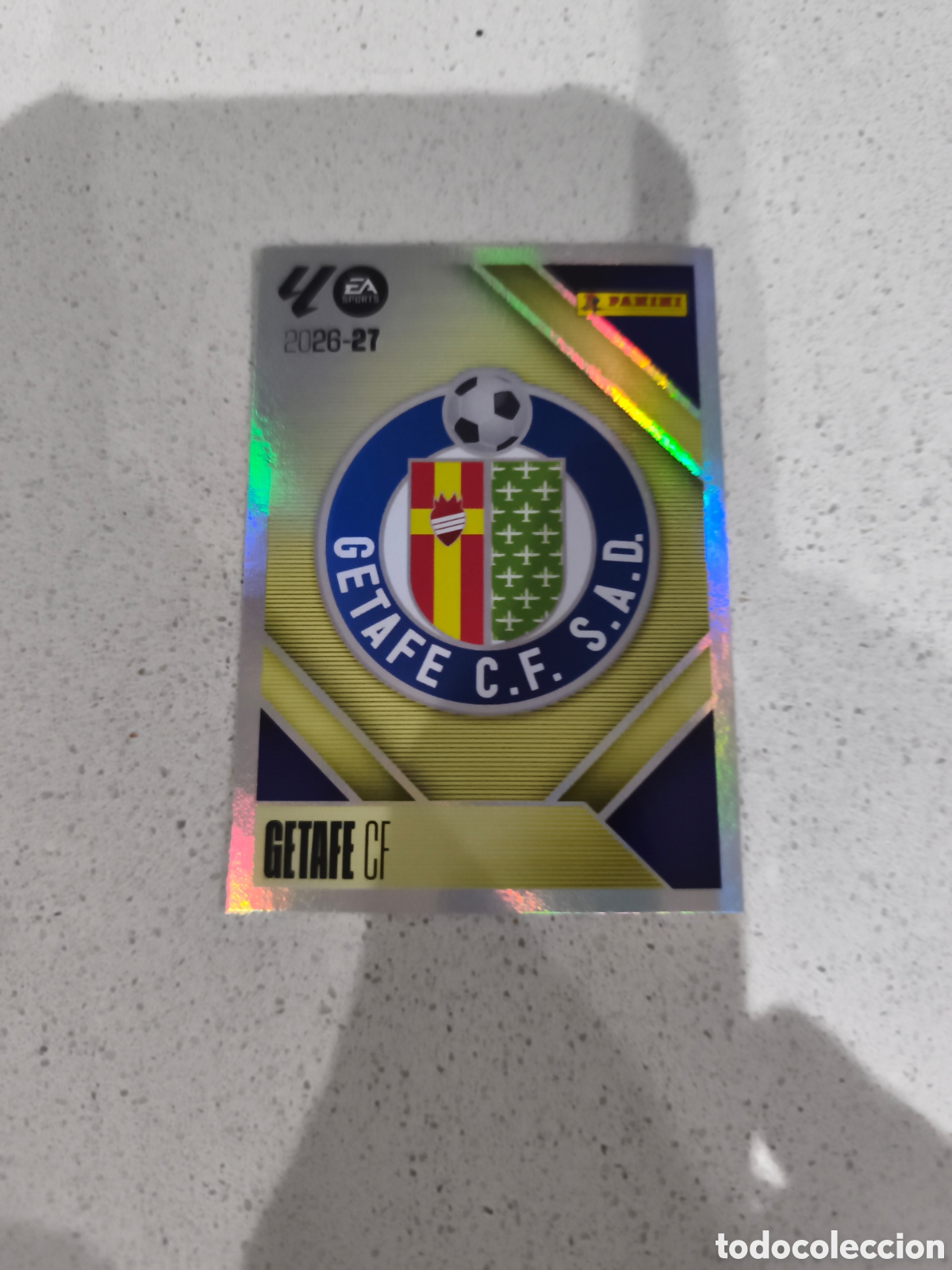 Cromos de f&uacute;tbol: CROMO N&Uacute;MERO 1 ESCUDO GETAFE. LIGA ESTE 26/27. PANINI.