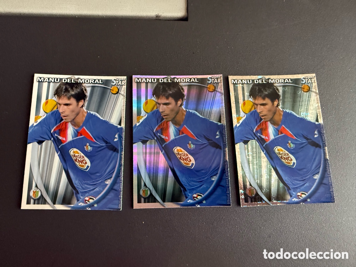 Cromos de f&uacute;tbol: MUNDICROMO 2011. 160. Star. MANU DEL MORAL ( Getafe ). Mate , Brillo rayas y Letras