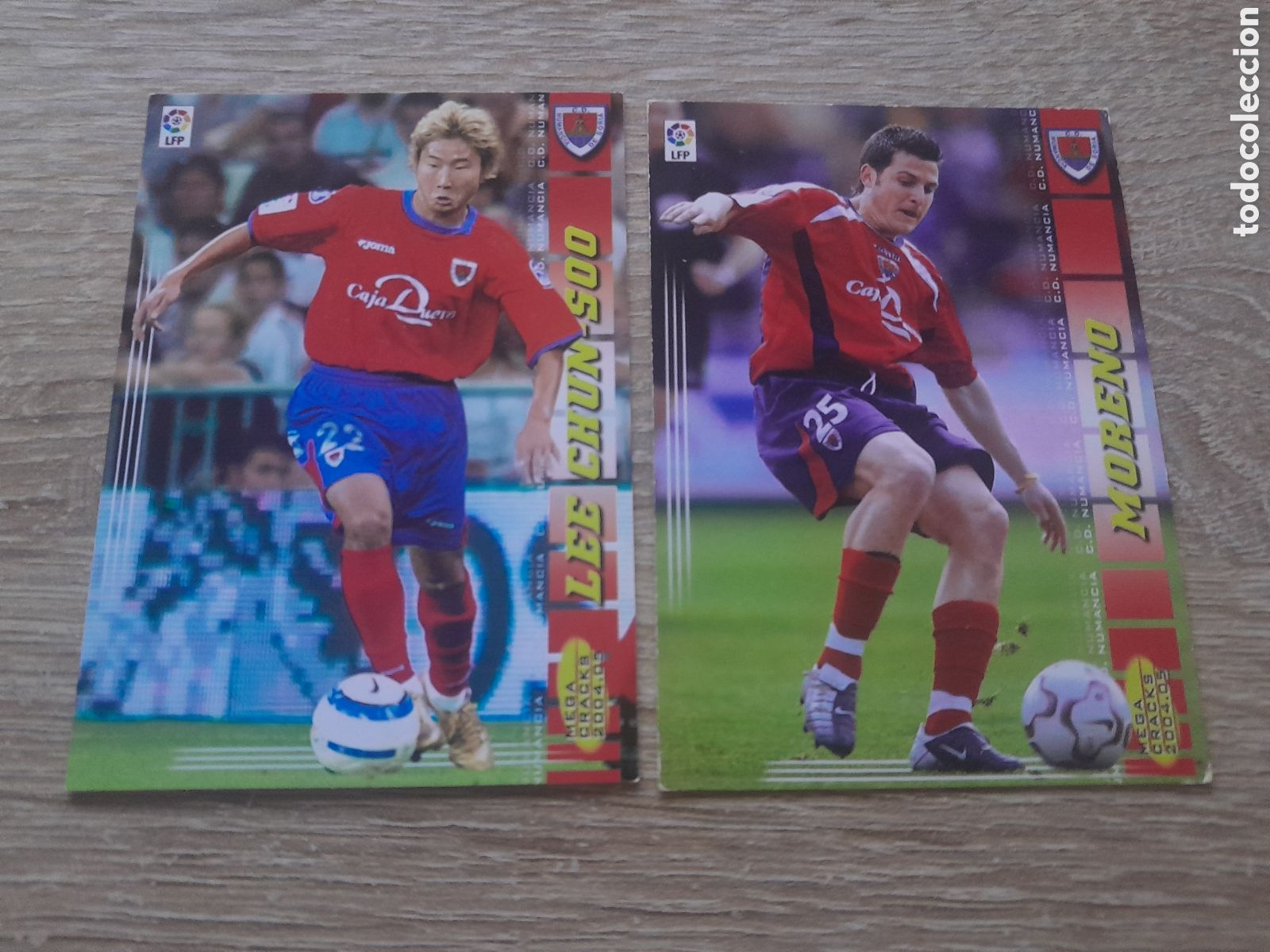 Cromos de f&uacute;tbol: lote 2 cromos mgk numancia 231 y 231 bis moreno y lee-chun soo megacracks 2004 2005