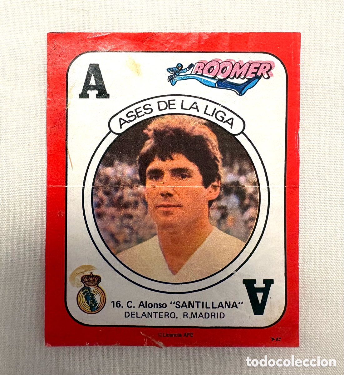 Cromos de f&uacute;tbol: CROMO 16 SANTILLANA REAL MADRID ROJO MUY DIF&Iacute;CIL BOOMER ASES DE LA LIGA 82 83 . MUY BIEN