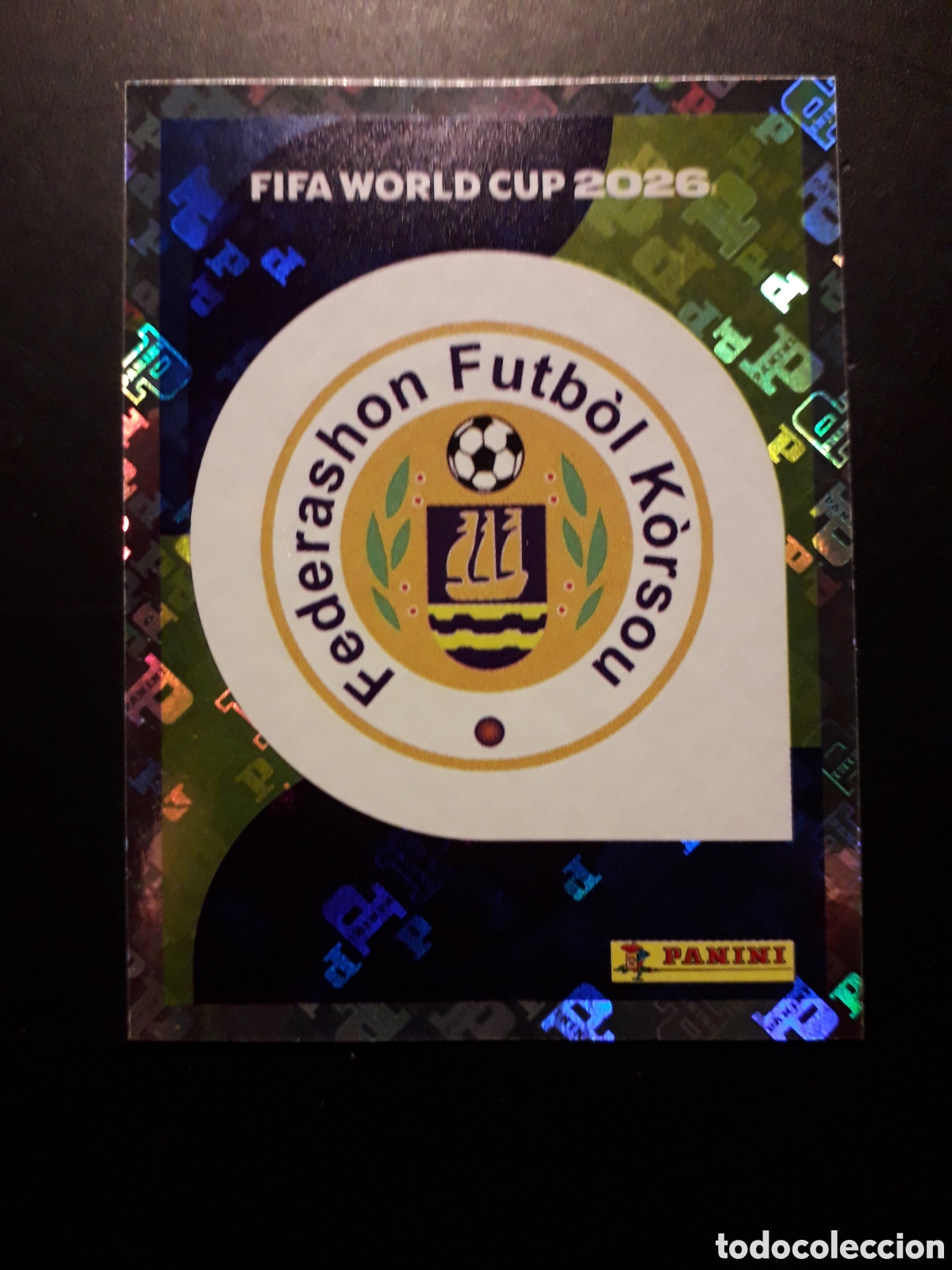 Cromos de f&uacute;tbol: ESCUDO CURA&Ccedil;AO CUW 1 MUNDIAL F&Uacute;TBOL 2026 FIFA WORLD CUP PANINI SIN PEGAR PEDIDO M&Iacute;NIMO 3&euro;