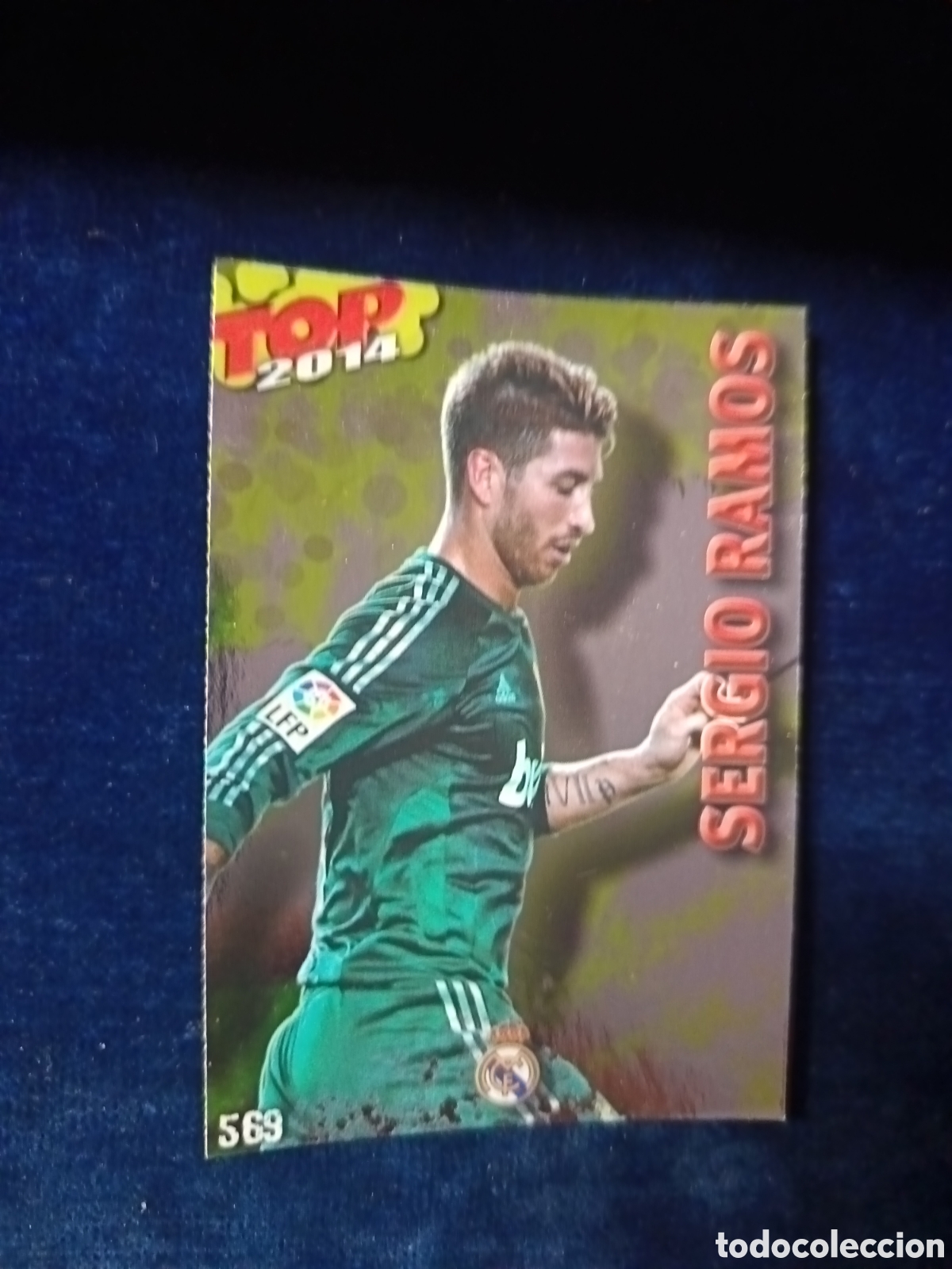 Cromos de f&uacute;tbol: 569 Sergio Ramos TOP BRILLO Dorado - MUNDICROMO 2013 2014 13-14