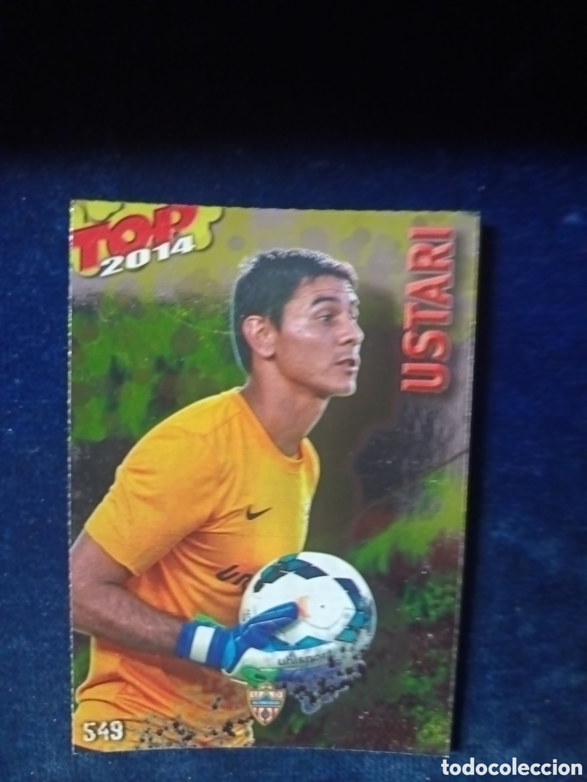 Cromos de f&uacute;tbol: 549 Ustari TOP BRILLO Dorado - MUNDICROMO 2013 2014 13-14