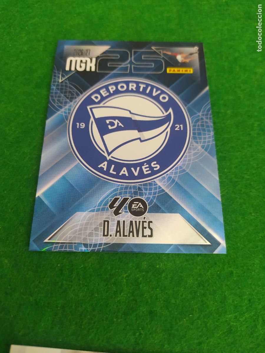 Cromos de f&uacute;tbol: MEGACRACKS 2026 2027 MGK 26 27 NUEVO - DEPORTIVO ALAVES N&ordm; 19 ESCUDO