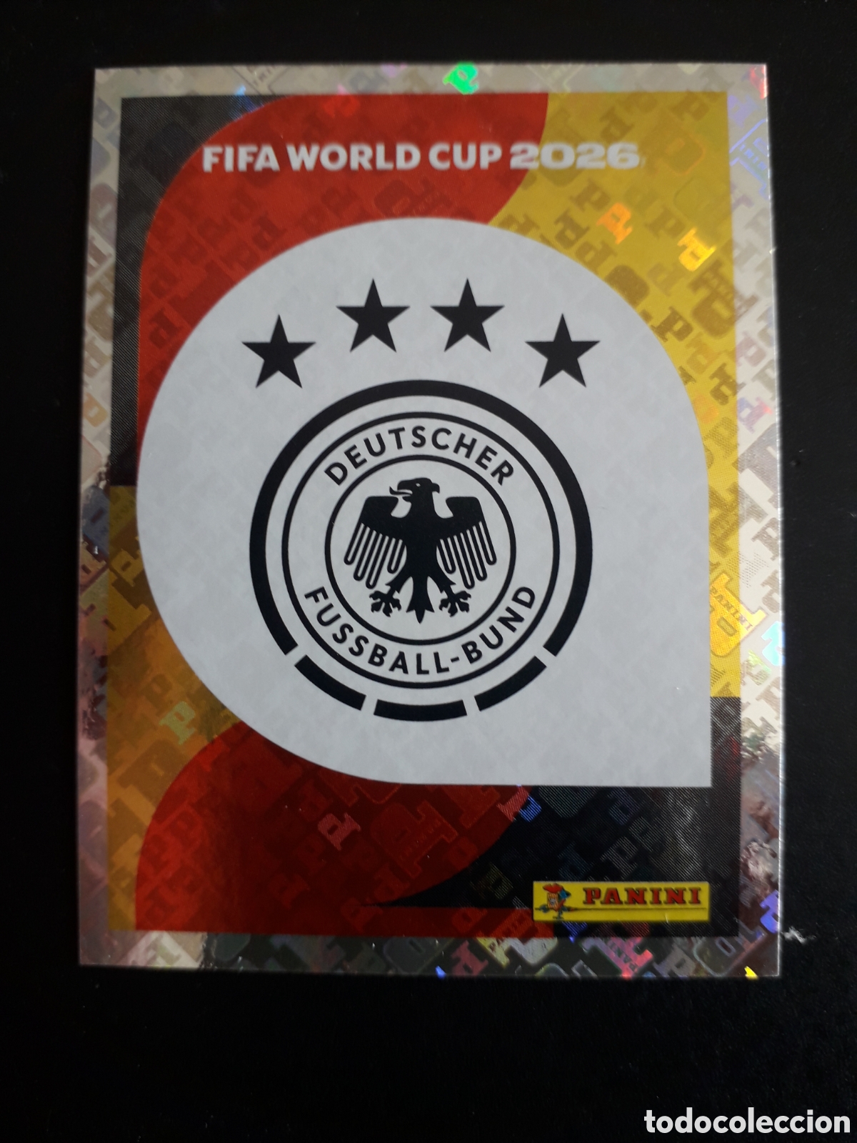 Cromos de f&uacute;tbol: ESCUDO ALEMANIA GER 1 MUNDIAL F&Uacute;TBOL 2026 FIFA WORLD CUP PANINI SIN PEGAR PEDIDO M&Iacute;NIMO 3&euro;