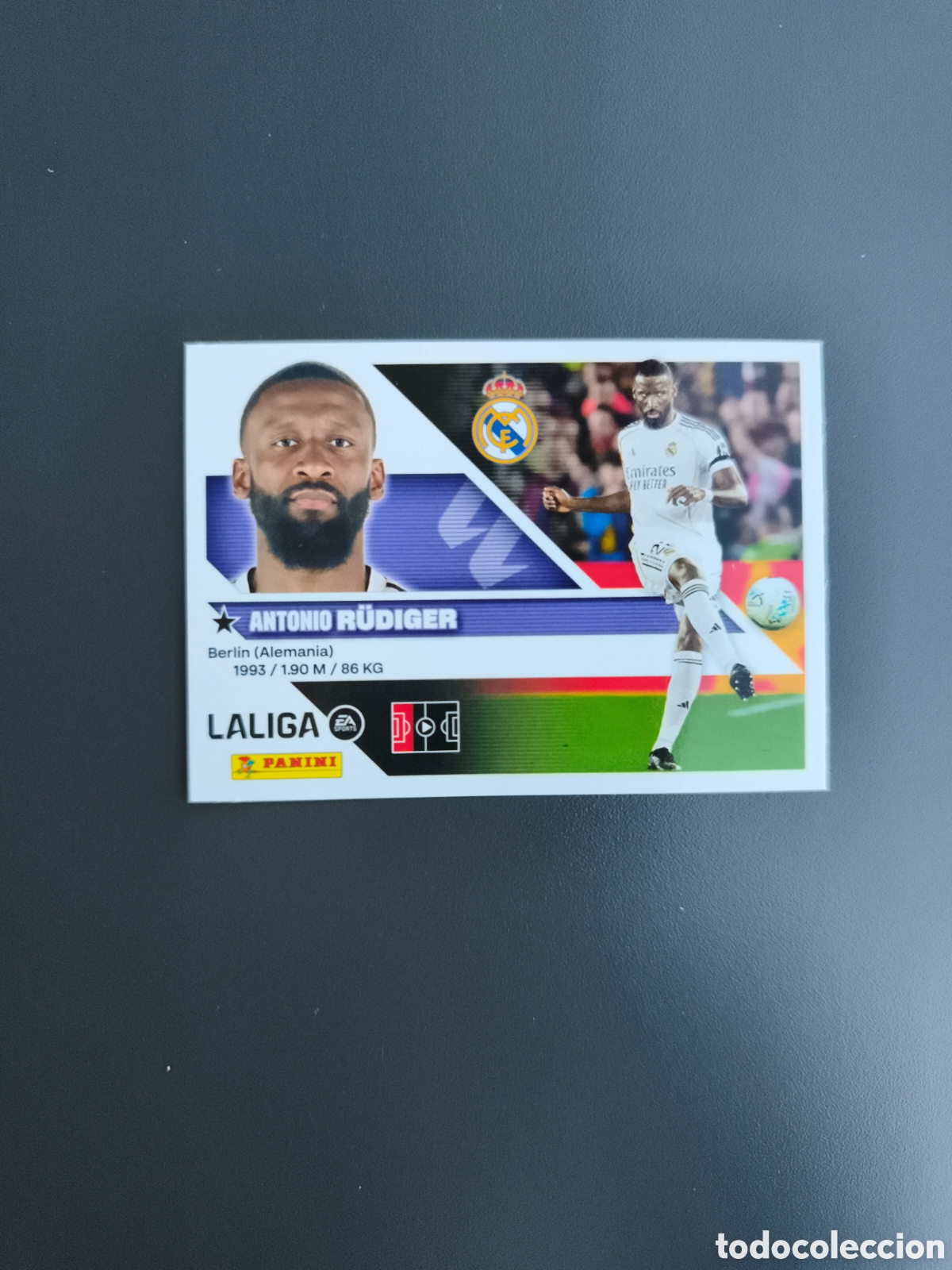 Cromos de f&uacute;tbol: CROMO N&Uacute;MERO 8 RUDIGER REAL MADRID. LIGA ESTE 26/27. PANINI.