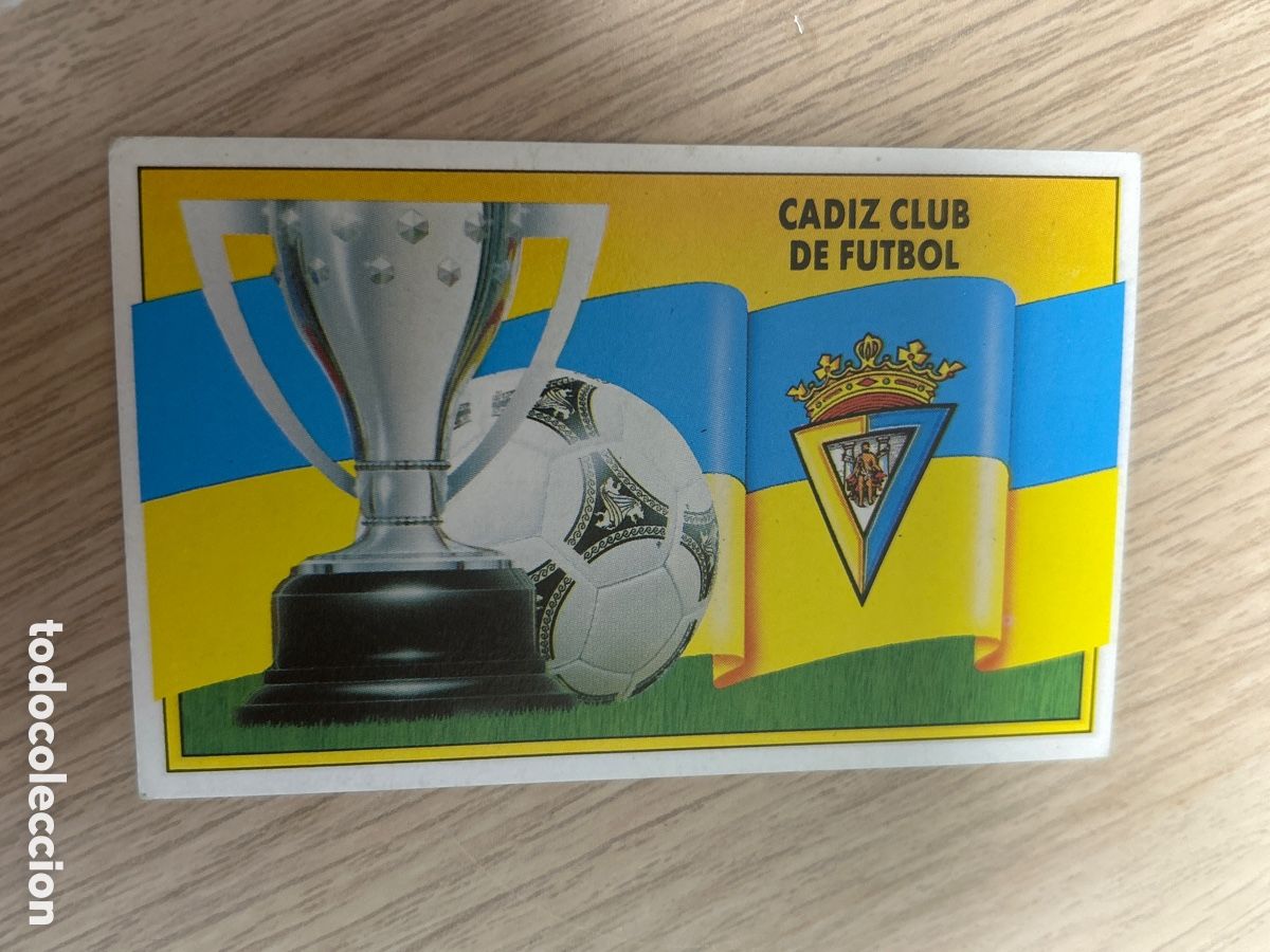 Football Stickers: ESCUDO Y BANDERA CADIZ LIGA ESTE 1990 1991 90 91 NUNCA PEGADO SIN PEGAR