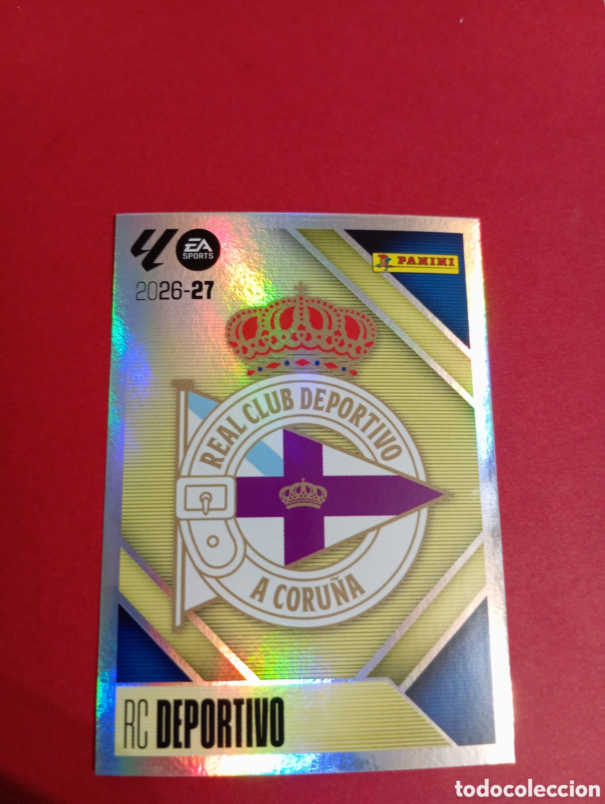 Cromos de Futebol: Escudo del Deportivo de la Coru&ntilde;a n&deg;1 / PANINI LIGA ESTE 2026/2027