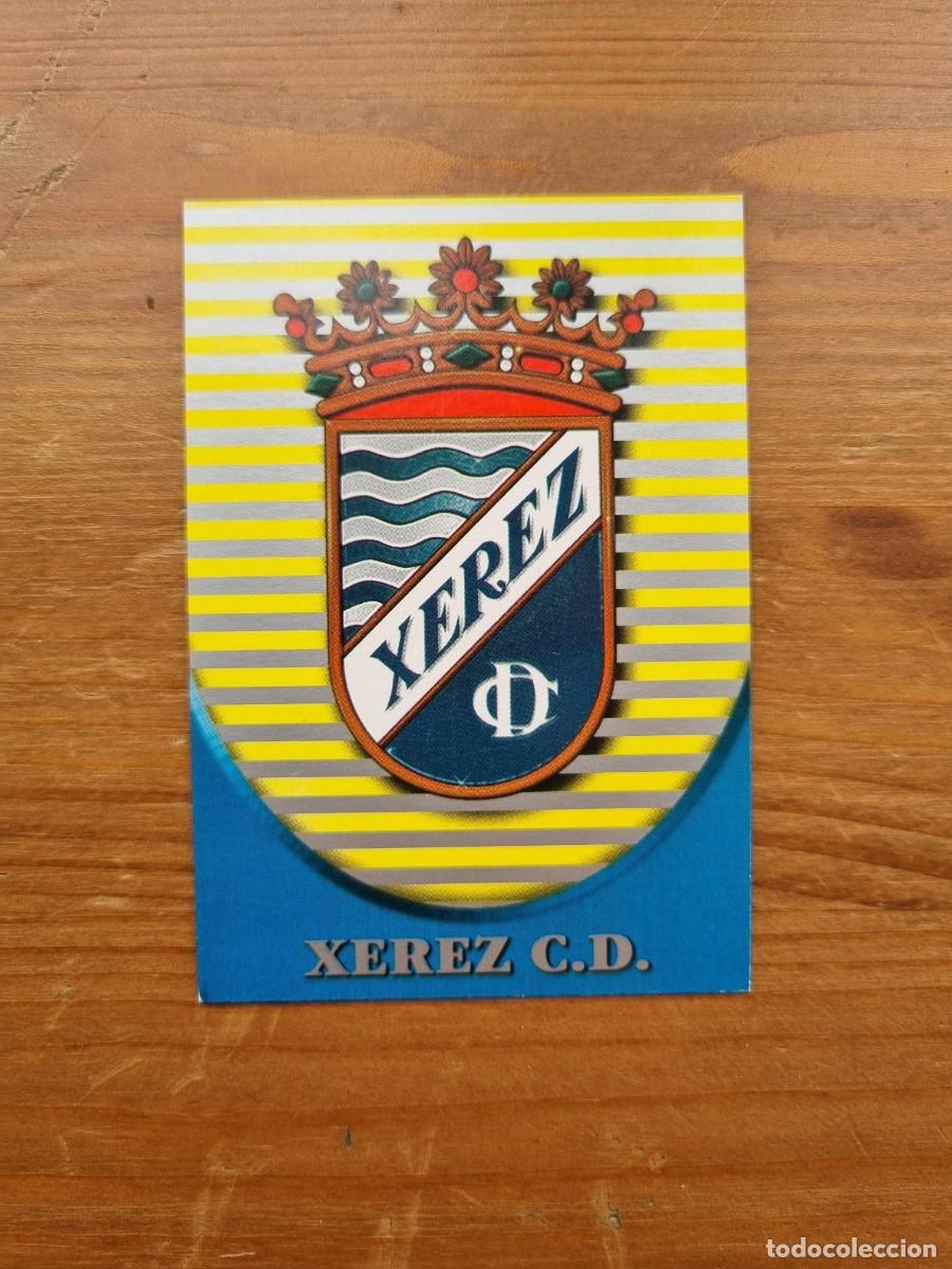 Cromos de f&uacute;tbol: 556 ESCUDO / ESTADIO (Xerez CD). Las Fichas de la Liga 2002 2003 02 03 (Mundicromo)