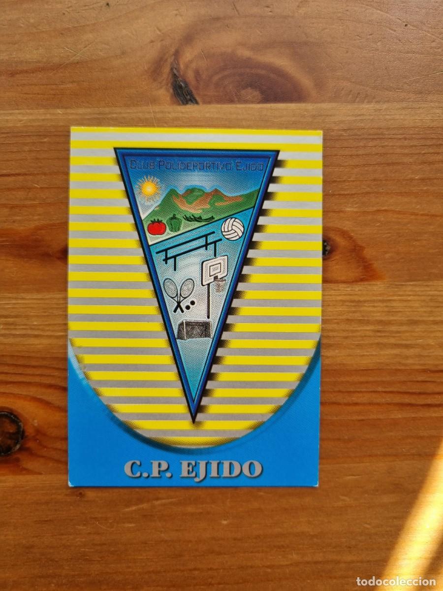 Cromos de f&uacute;tbol: 569 ESCUDO / ESTADIO (CP Ejido). Las Fichas de la Liga 2002 2003 02 03 (Mundicromo)