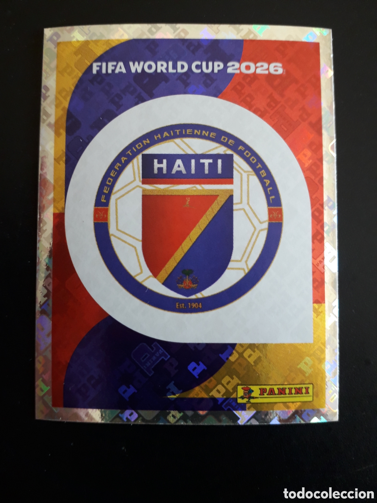 Cromos de f&uacute;tbol: ESCUDO HAIT&Iacute; HAI 1 MUNDIAL F&Uacute;TBOL 2026 FIFA WORLD CUP PANINI SIN PEGAR PEDIDO M&Iacute;NIMO 3&euro;