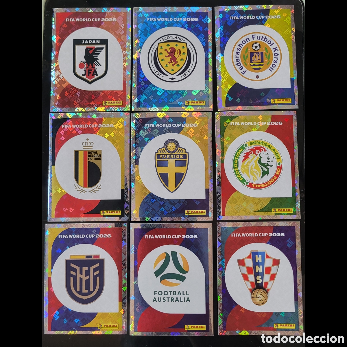 Figurine di Calcio: [LOTE] 9x Escudos Selecciones [Sticker] / FIFA World Cup 2026