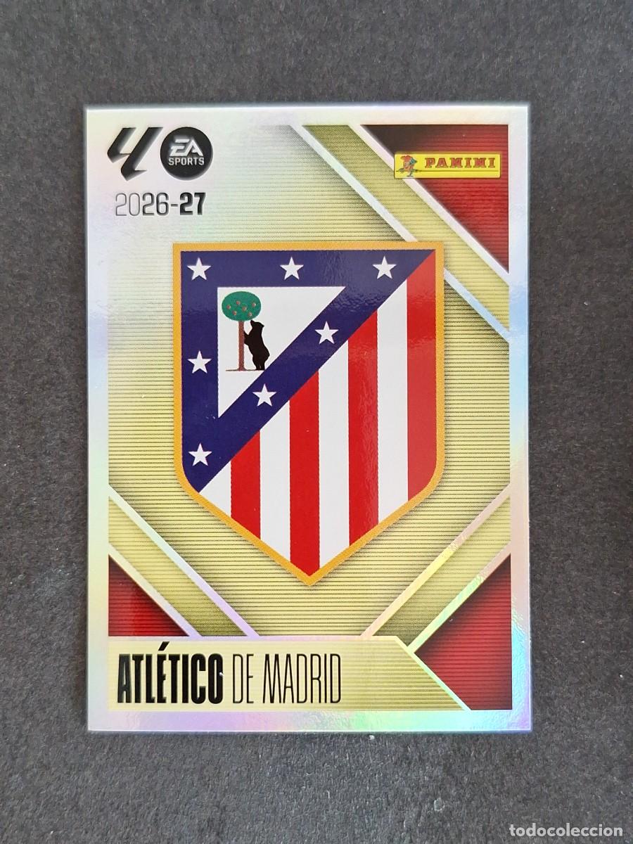Cromos de f&uacute;tbol: L1 ESCUDO ATLETICO DE MADRID LIGA ESTE 2026 2027 26 27 NUNCA PEGADO SIN PEGAR