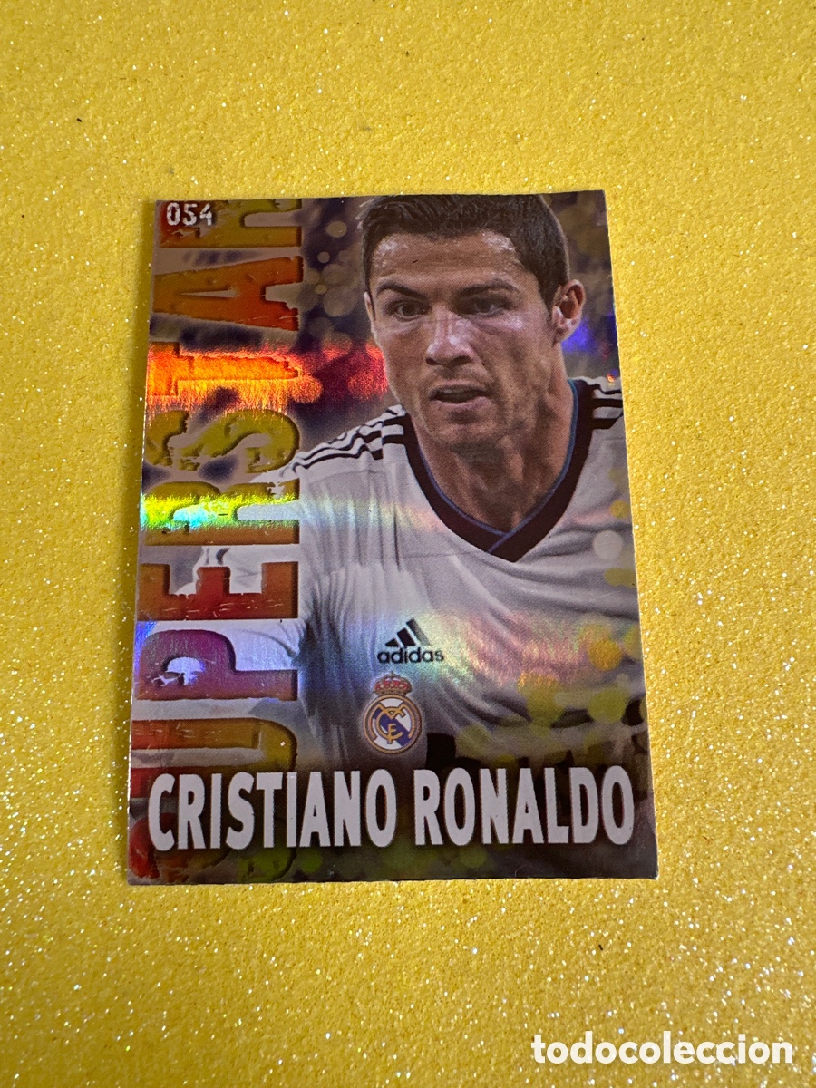 Cartes &agrave; collectionner de Football: 54 CRISTIANO RONALDO (R.MADRID) SUPERSTAR FONDO RAYAS MNDICROMO 2013