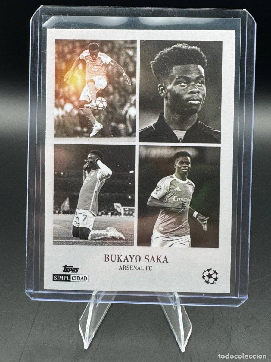 Cromos de f&uacute;tbol: Bukayo Saka Topps Simplicidad Ra&iacute;ces