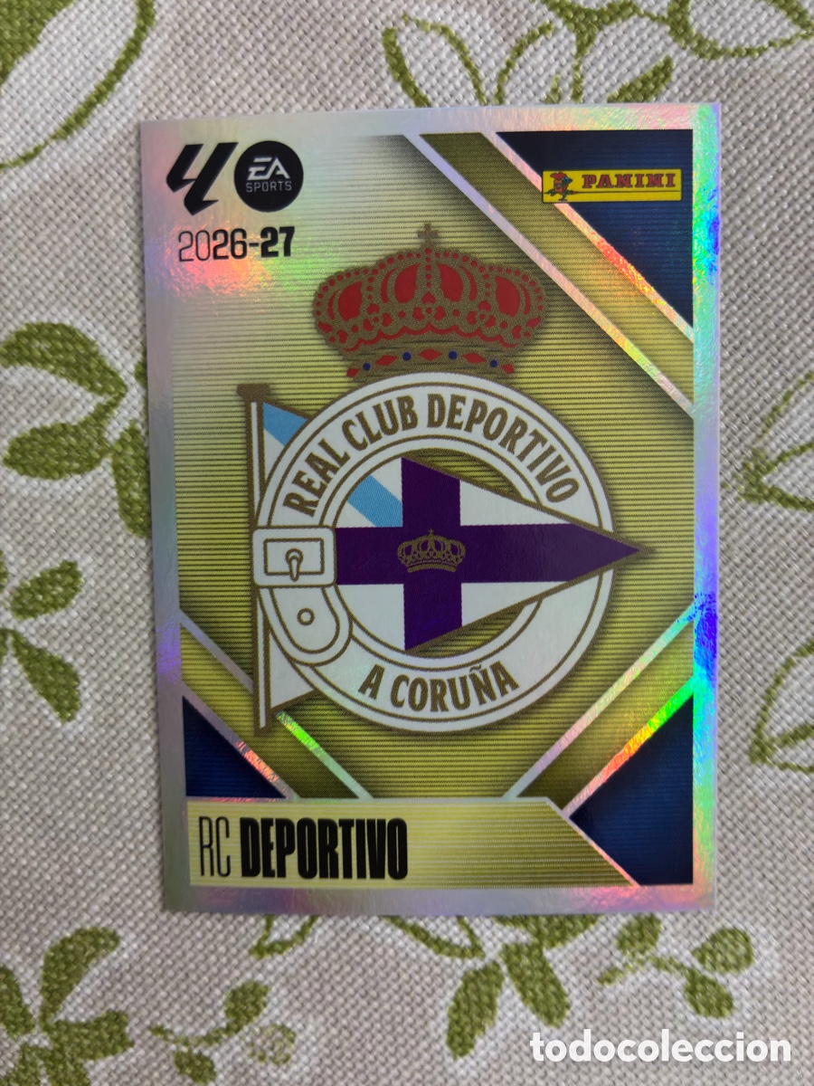 Cromos de f&uacute;tbol: Escudo RC Deportivo N.&ordm; 1 - Metalizado / Brillante - Colecci&oacute;n Liga 2026-27 Ediciones Este / Panini