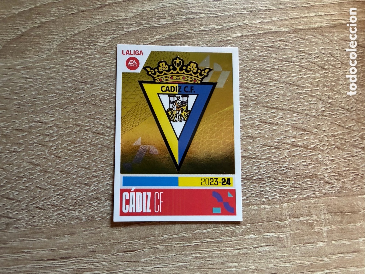 Cromos de f&uacute;tbol: 1 ESCUDO C&Aacute;DIZ CF LALIGA EA SPORTS COLECCI&Oacute;N LIGA ESTE EDICIONES ESTE 2023 2024 23 24 PANINI