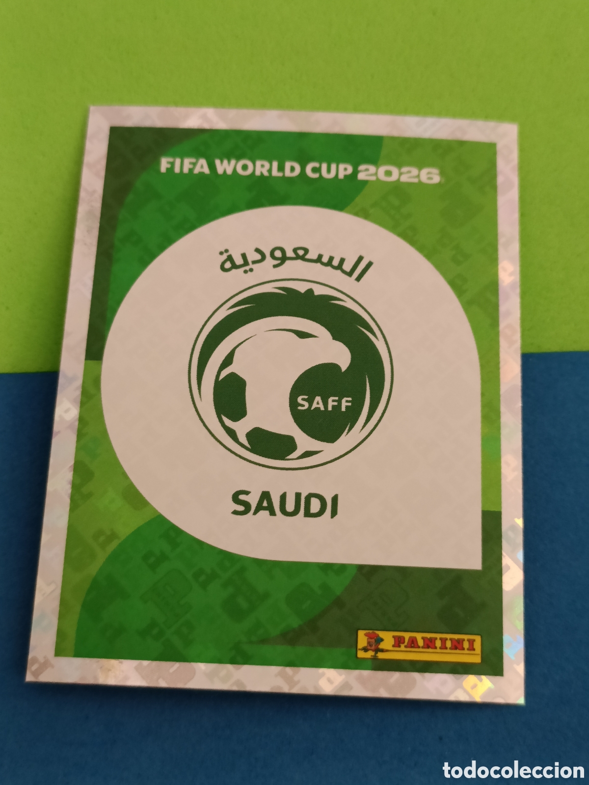 Fu&szlig;ball-Sticker: Panini Mundial Fifa World cup 2026 26 sticker - KSA 1 Escudo Arabia Saudi