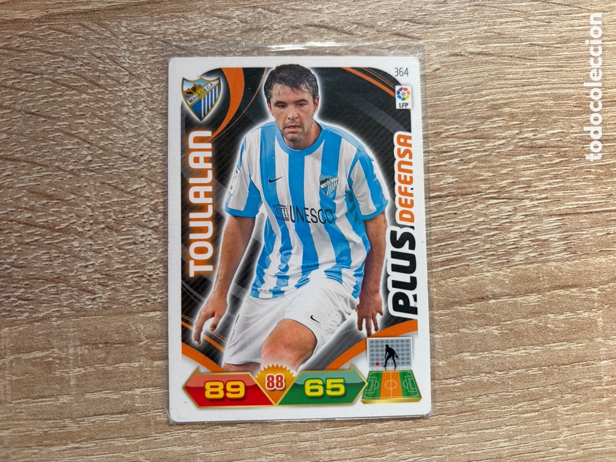 Cromos de f&uacute;tbol: TOULALAN PLUS DEFENSA ADRENALYN XL 2011 2012 11 12 M&Aacute;LAGA CF