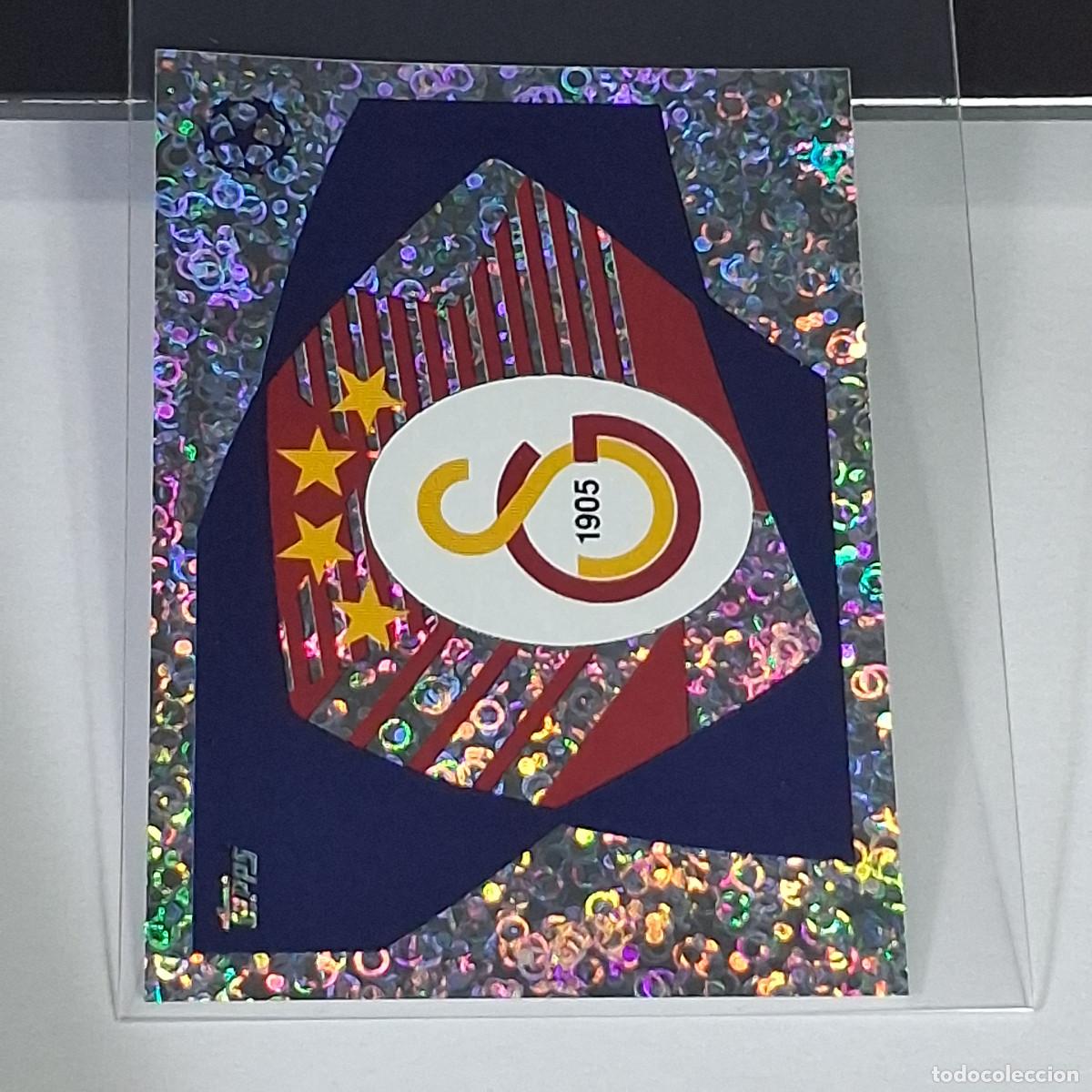 Fu&szlig;ball-Sticker: B63 560 ESCUDO LOGO BADGE GALATASARAY CHAMPIONS STICKER 2023 2024 23 24 ALBUM TOPPS LEAGUE