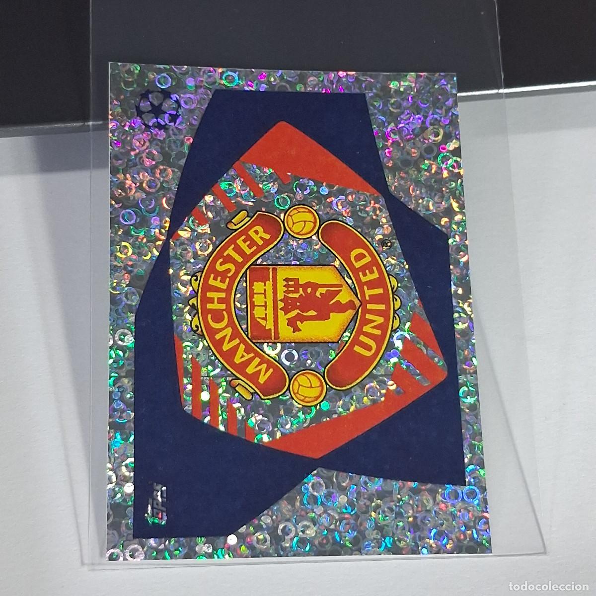 Cromos de Futebol: B65 313 ESCUDO LOGO BADGE MANCHESTER UNITED CHAMPIONS STICKER 2023 2024 23 24 ALBUM TOPPS LEAGUE