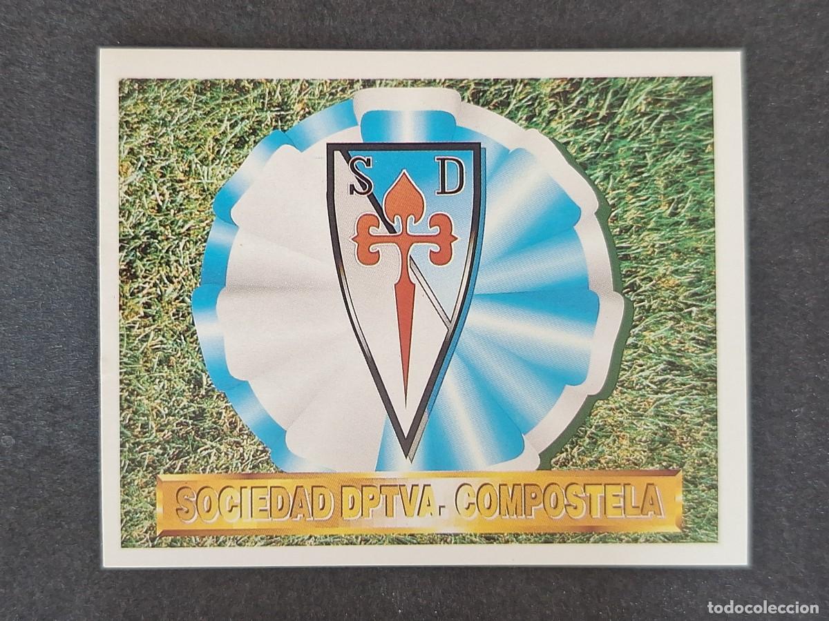 Cromos de f&uacute;tbol: L5 ESCUDO S. D. COMPOSTELA LIGA ESTE 1994 1995 94 95 NUNCA PEGADO SIN PEGAR