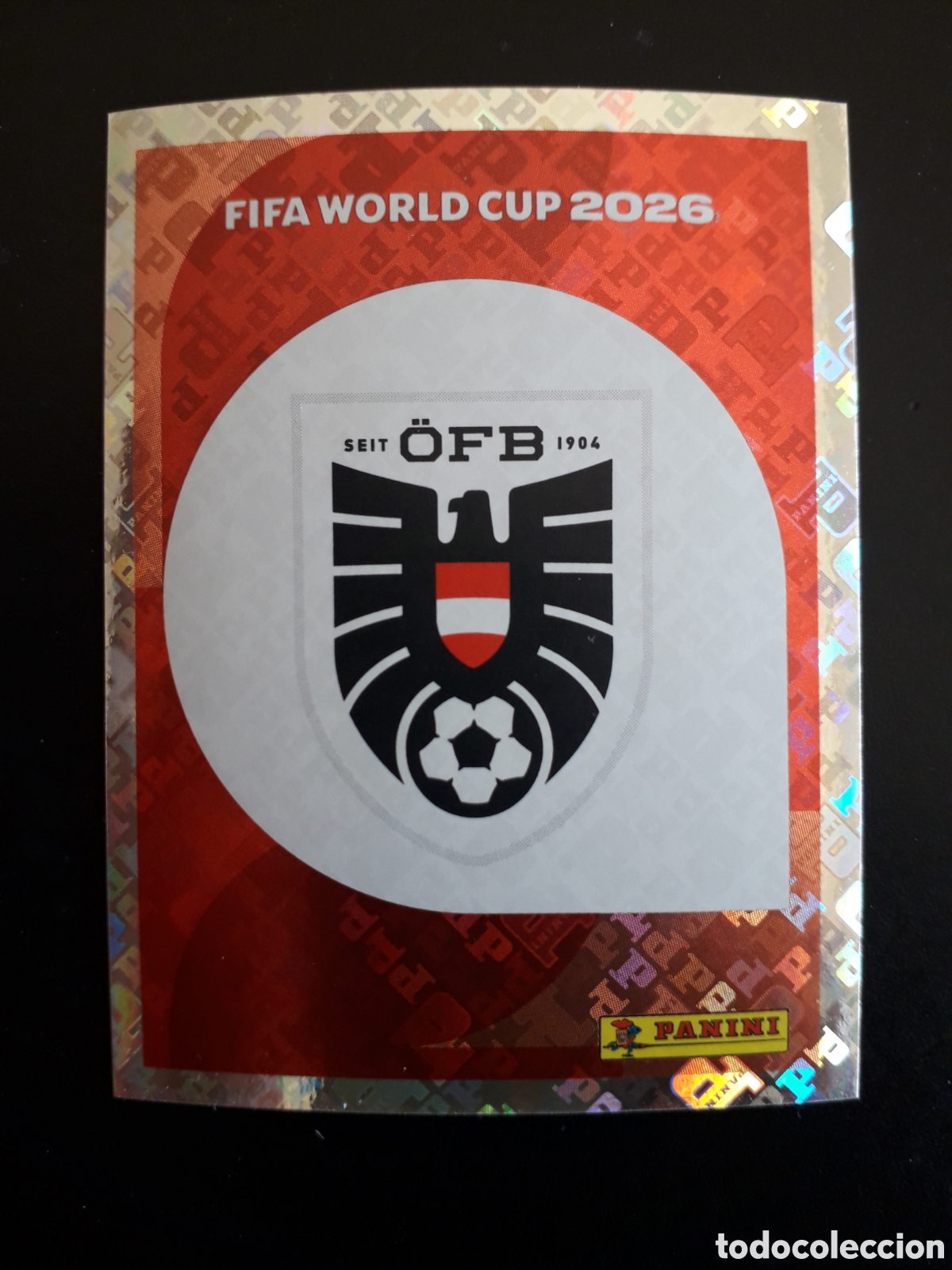 Cromos de f&uacute;tbol: ESCUDO AUSTRIA AUT 1 MUNDIAL F&Uacute;TBOL 2026 FIFA WORLD CUP PANINI SIN PEGAR PEDIDO M&Iacute;NIMO 3&euro;.