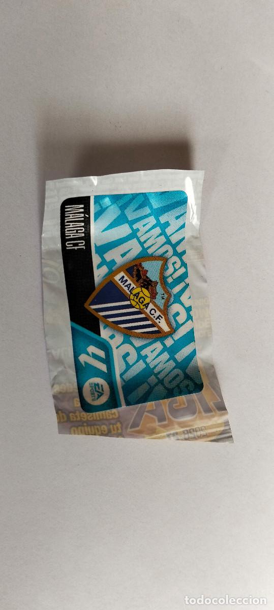 Cromos de f&uacute;tbol: CROMO CHICLE . LIGA ESTE 2026 - 27 ... ESCUDO MALAGA -- LEER ANUNCIO.