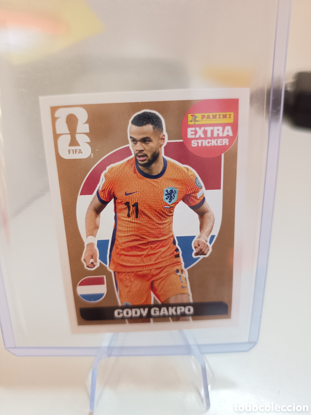 Cromos de f&uacute;tbol: EXTRA STICKER MUNDIAL WORLD CUP 2026 BRONCE cody gakpo