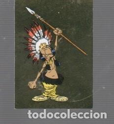 Figurine di Calcio: CROMO DE 60 A&Ntilde;OS DE AVENTURES ASTERIX N&ordm; 103 DE PANINI DEL A&Ntilde;O 2019 NO ESTUVO PEGADOS COLOR ORO
